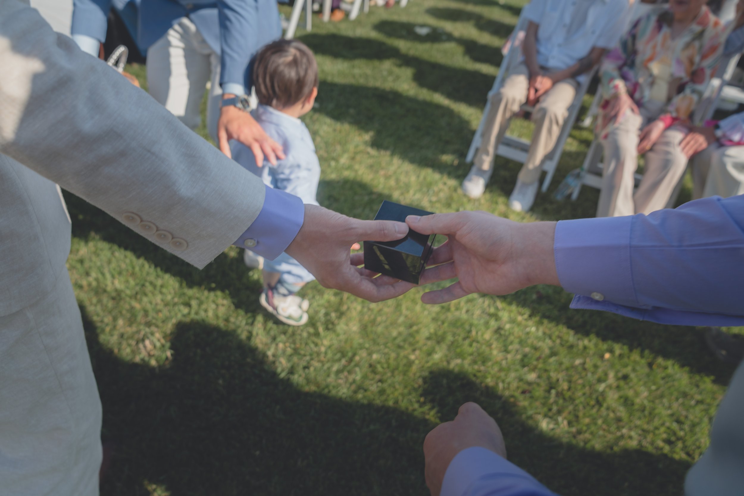 Flower boy reaching the ceremony area during Katherine and Calvin’s Sonoma wedding.