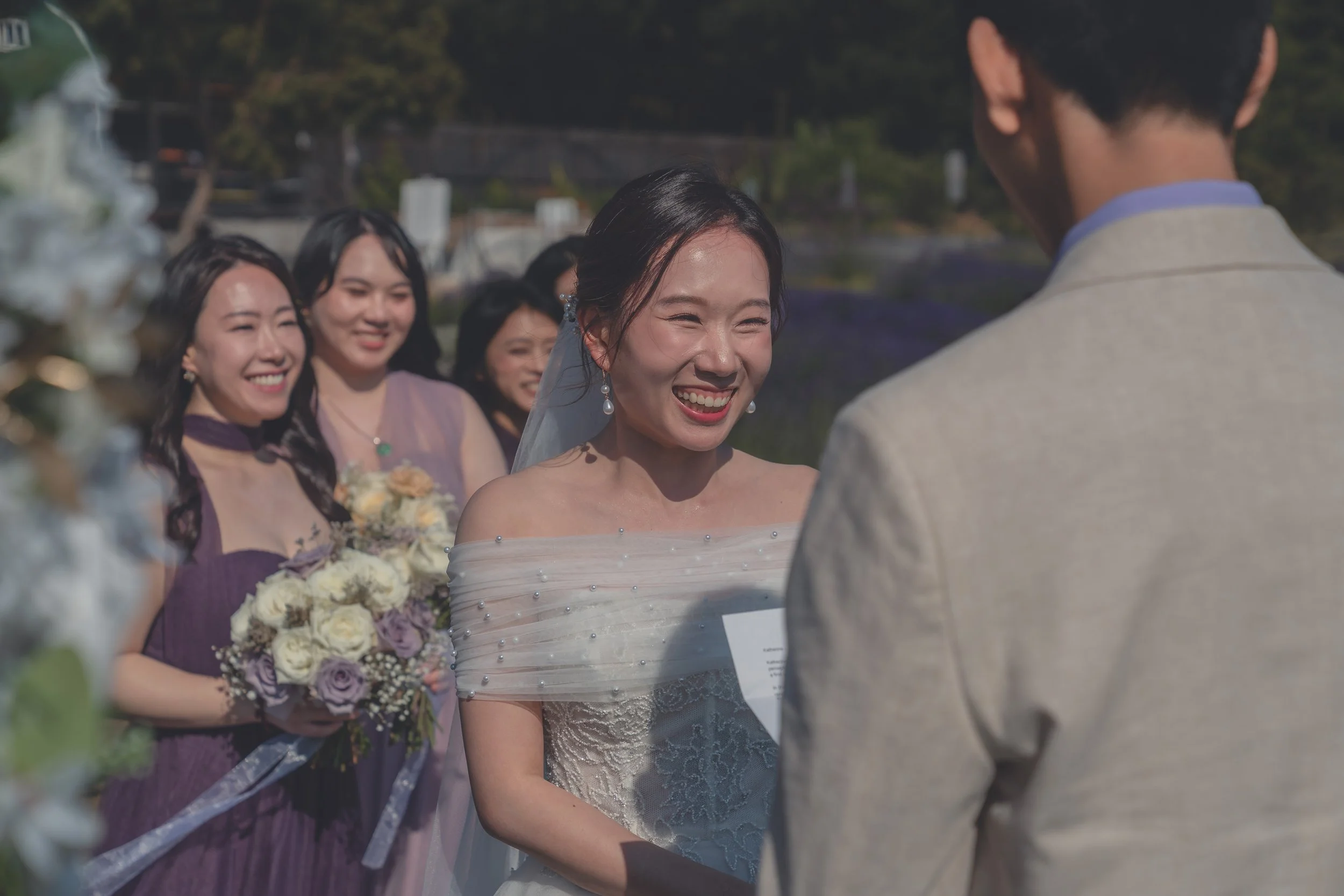 Emotional reactions from the bridal party during the ceremony in California wine country.