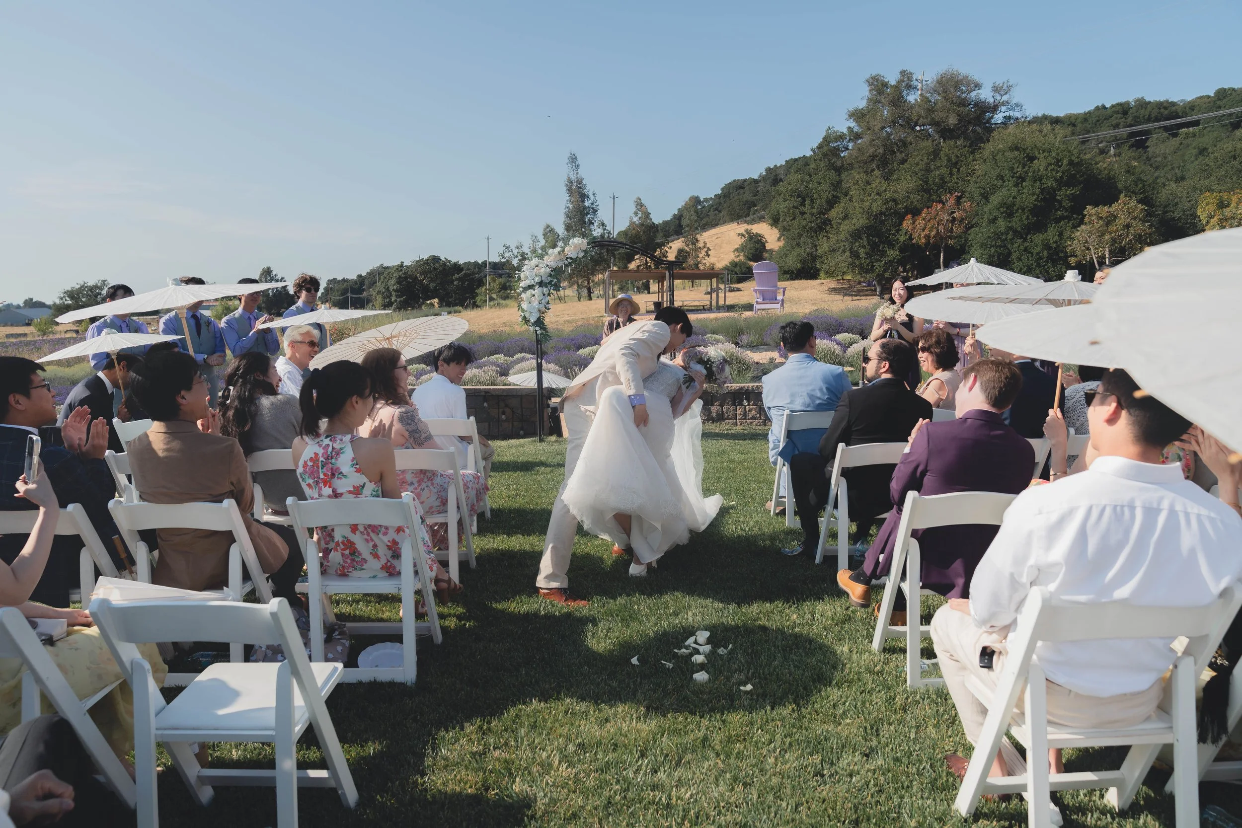 Newly married couple beginning their walk back down the aisle at a Sonoma wedding.
