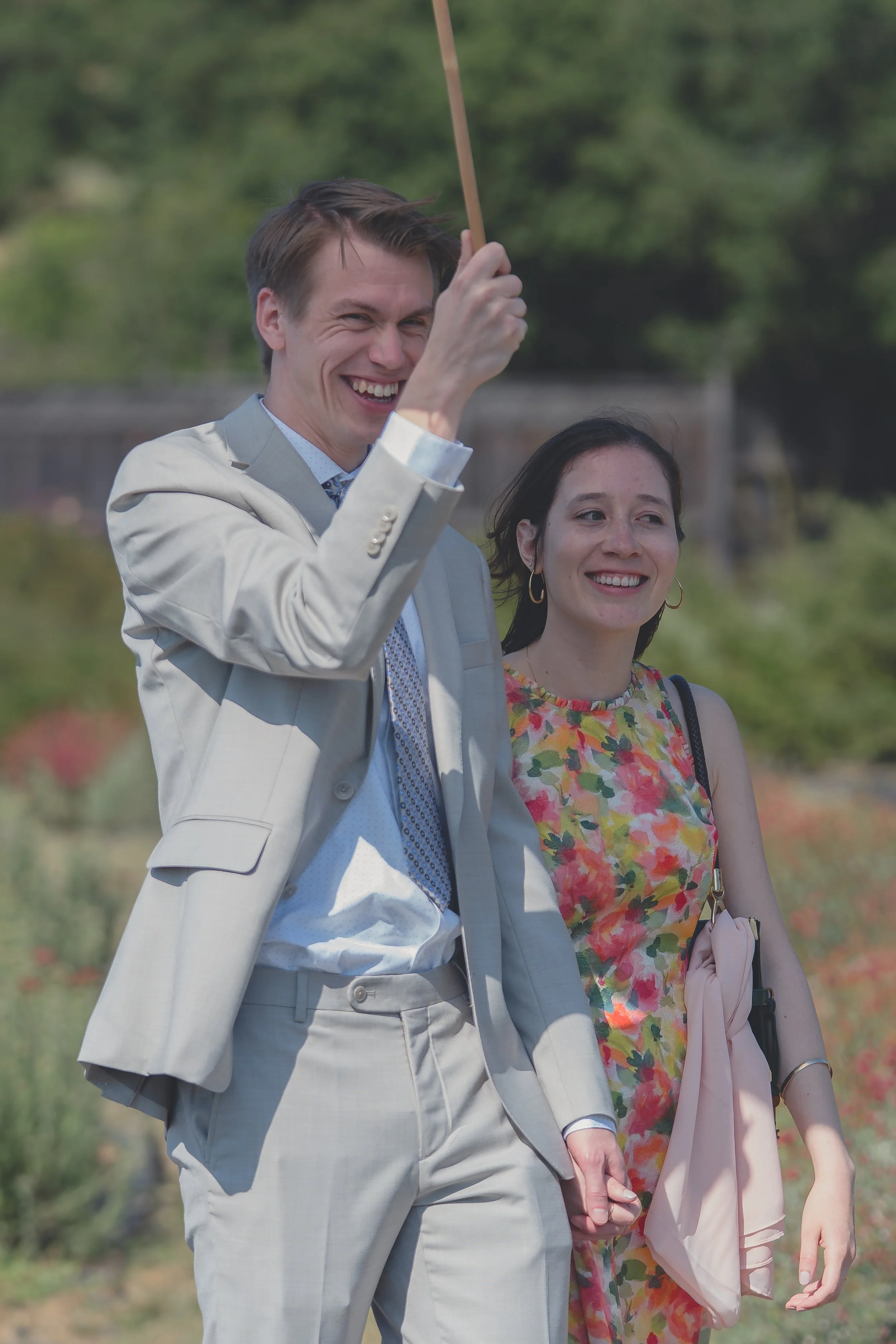 Wedding guests walking together outdoors during a Sonoma celebration.