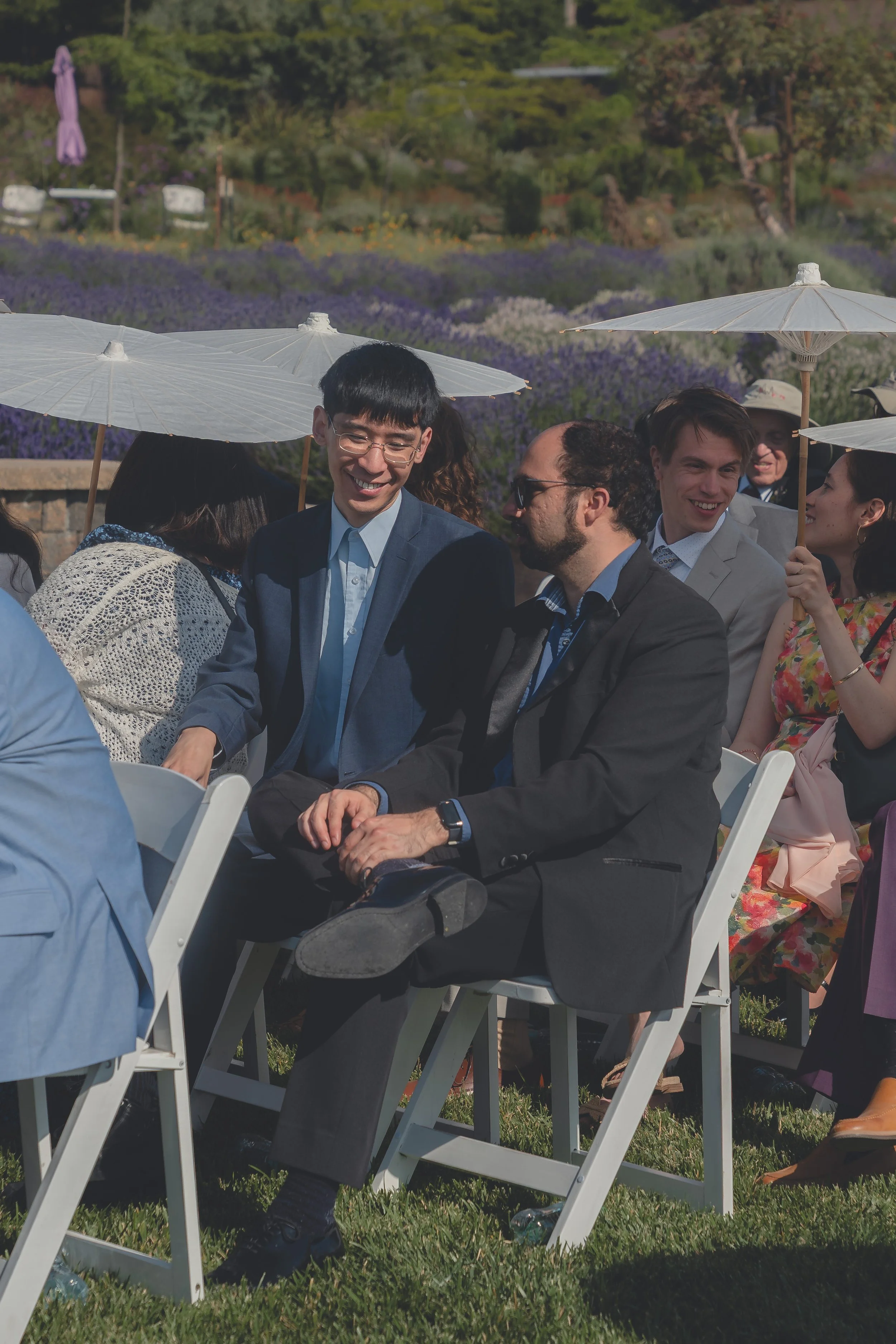 Wedding guests seated beneath the open sky at a Sonoma wedding.