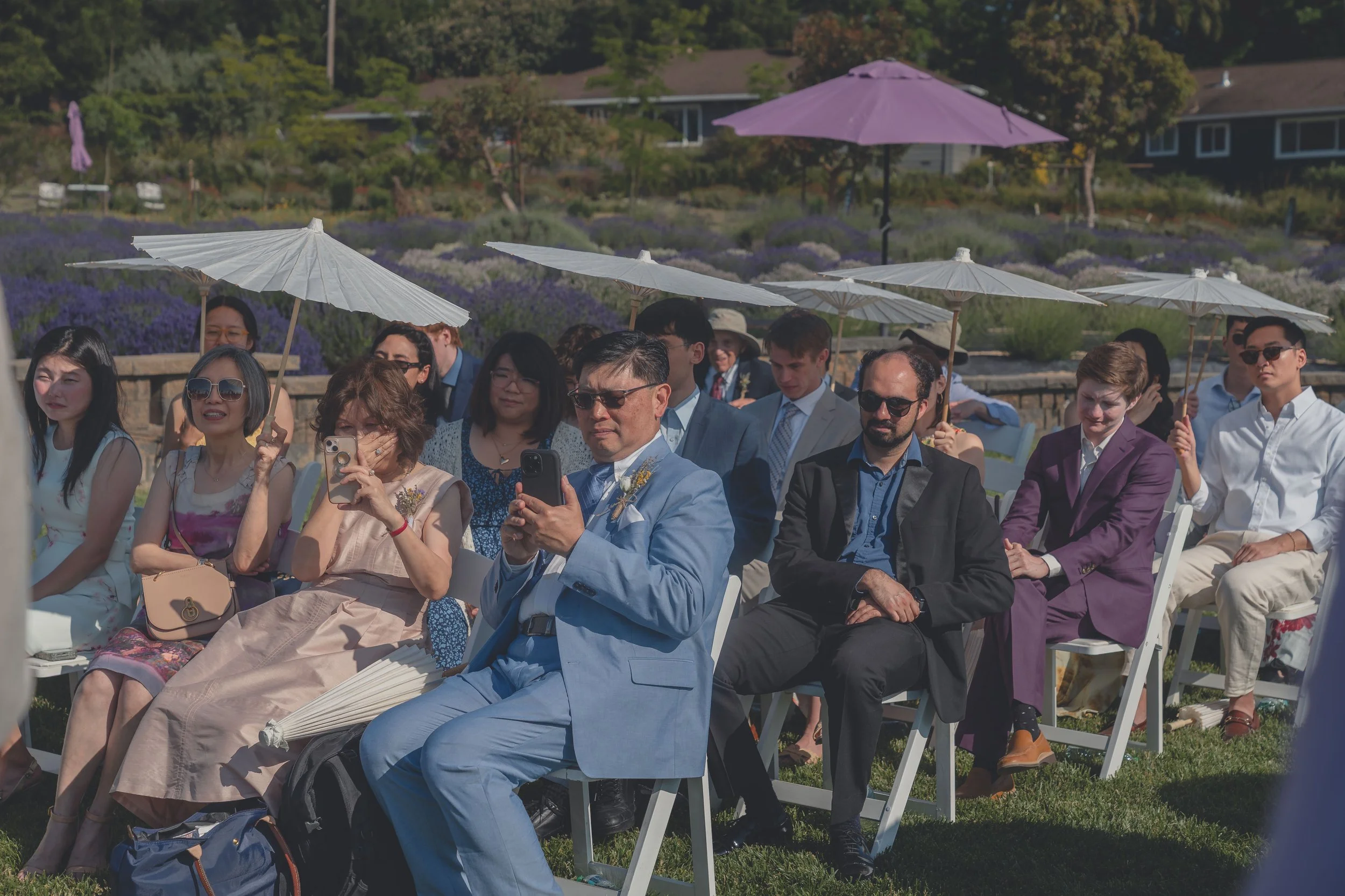 Guests seated and listening quietly during the wedding ceremony in Sonoma.