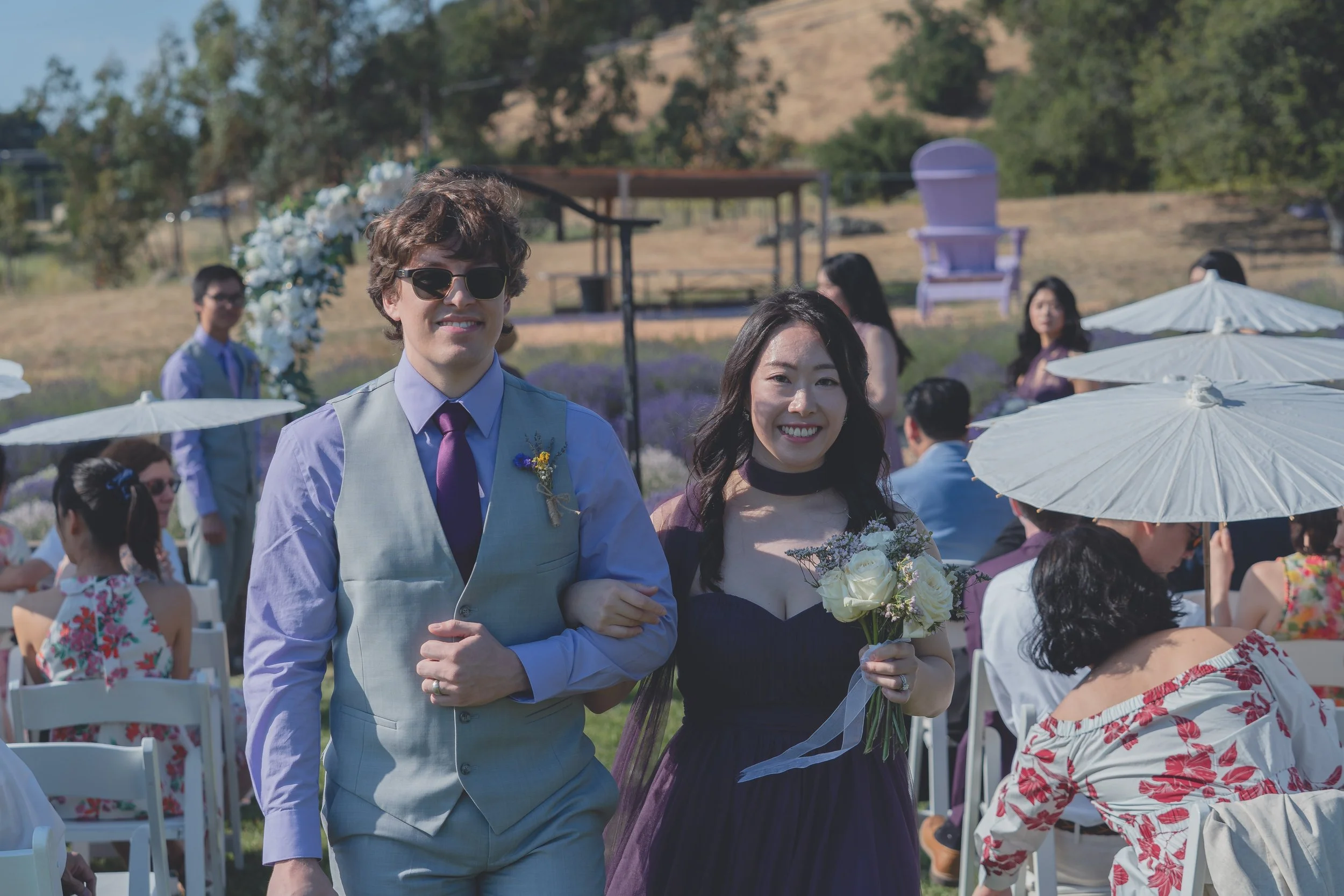 Bride and groom greeting guests after the ceremony at a Sonoma wedding.