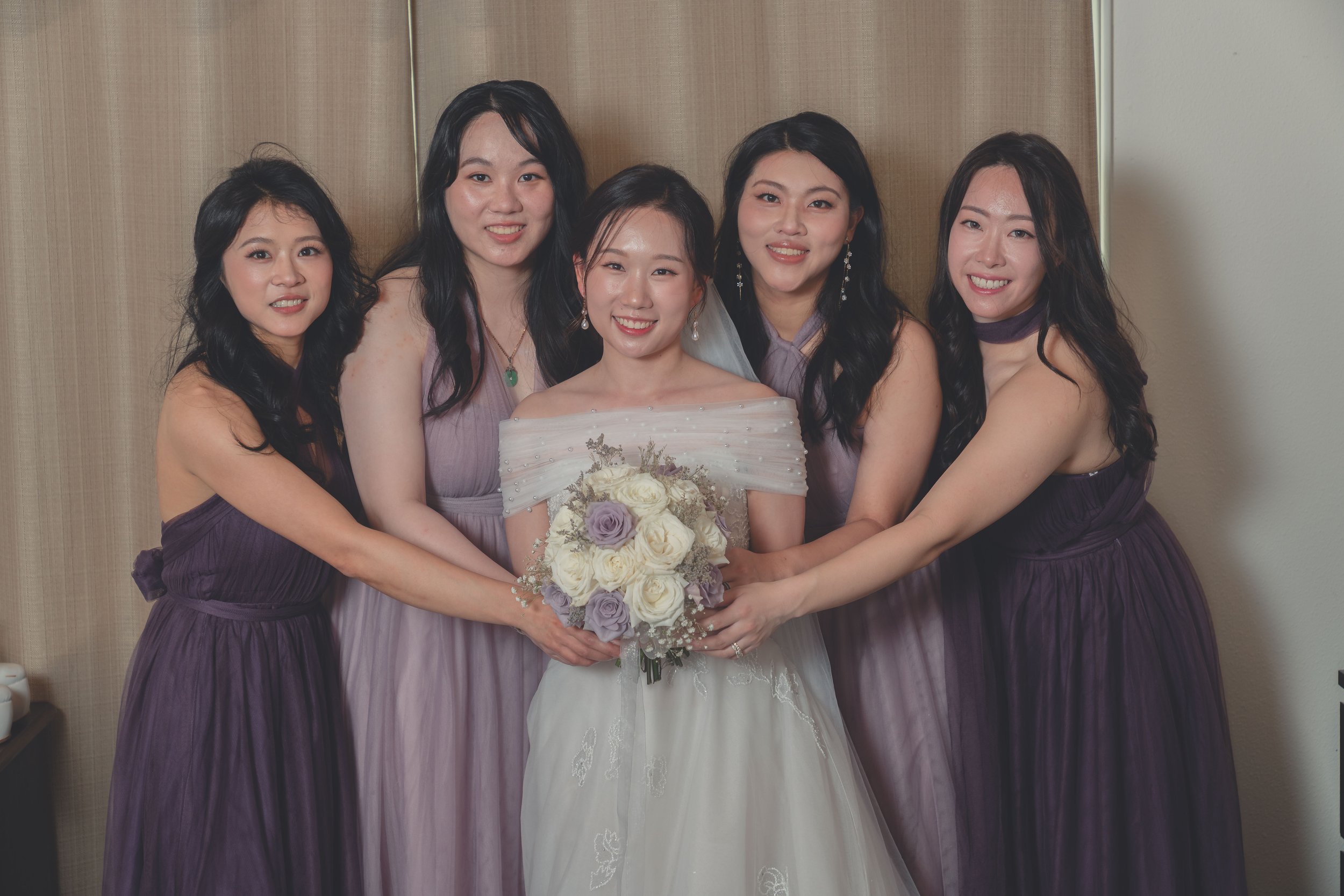 Bridesmaids standing together in a group portrait at a Sonoma wedding.