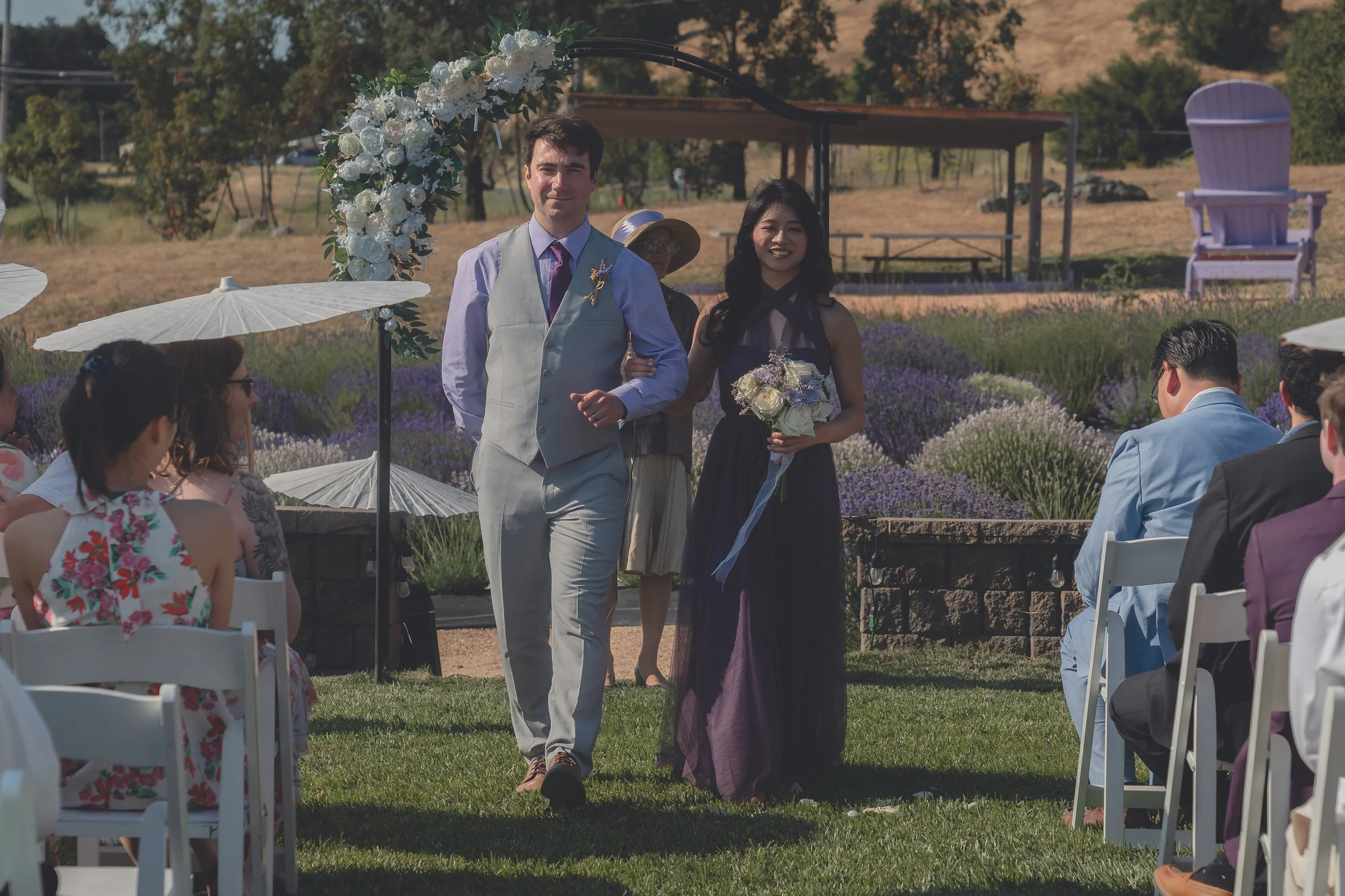 Bride and groom pausing for a moment together after the ceremony in Sonoma.