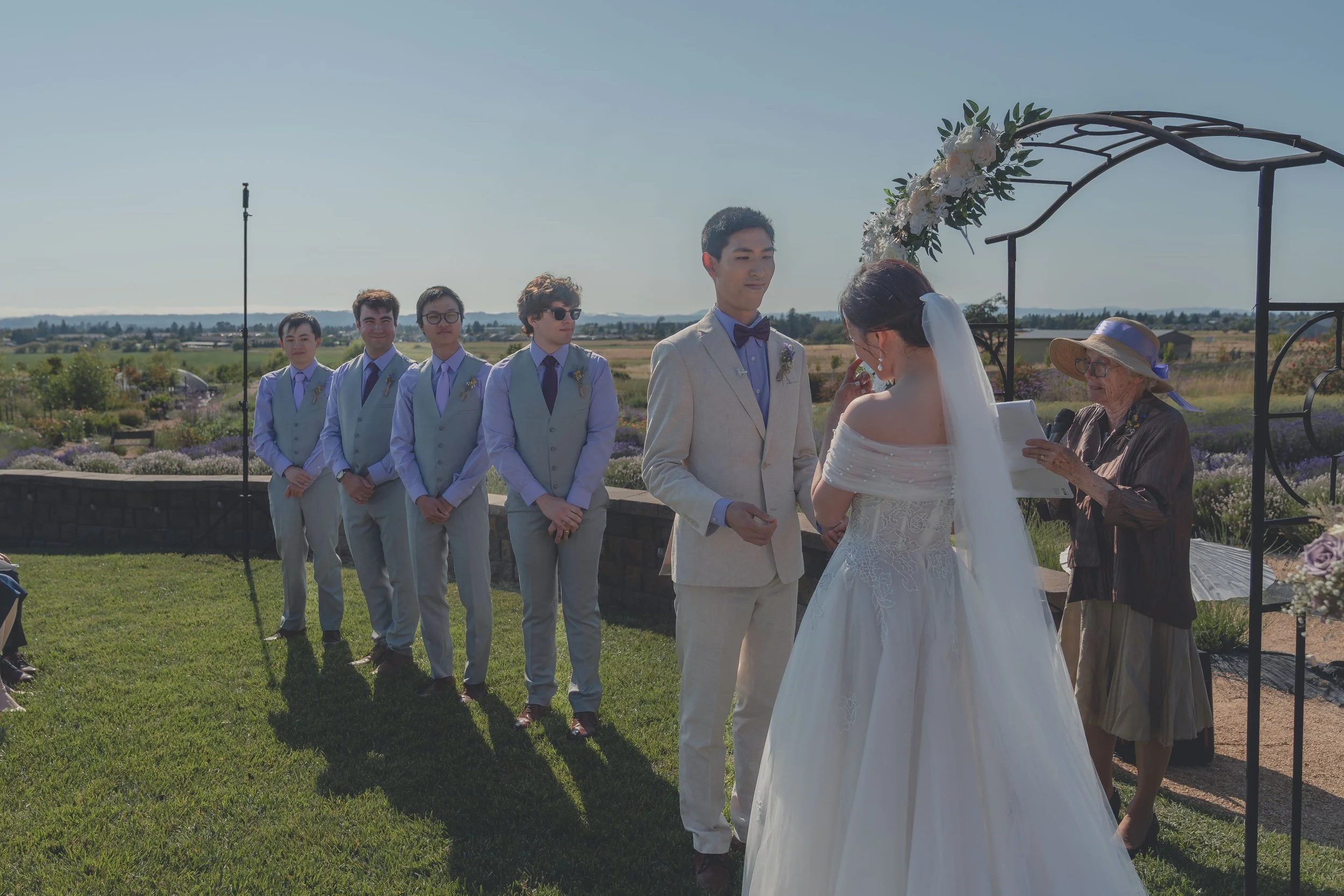 Wide view of the wedding ceremony framed by the Sonoma landscape.