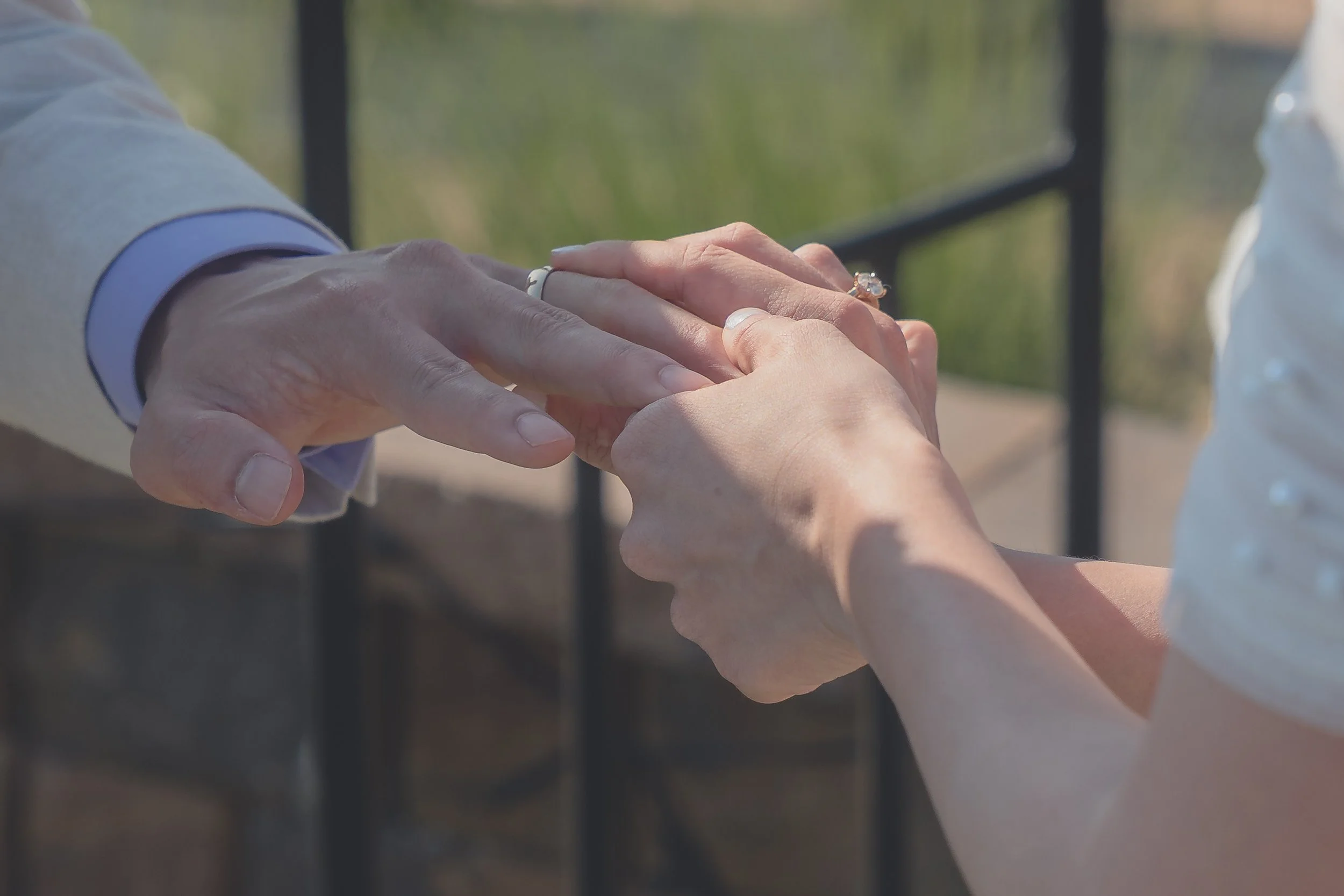 Groom placing the wedding ring on the bride’s hand during their Sonoma ceremony.