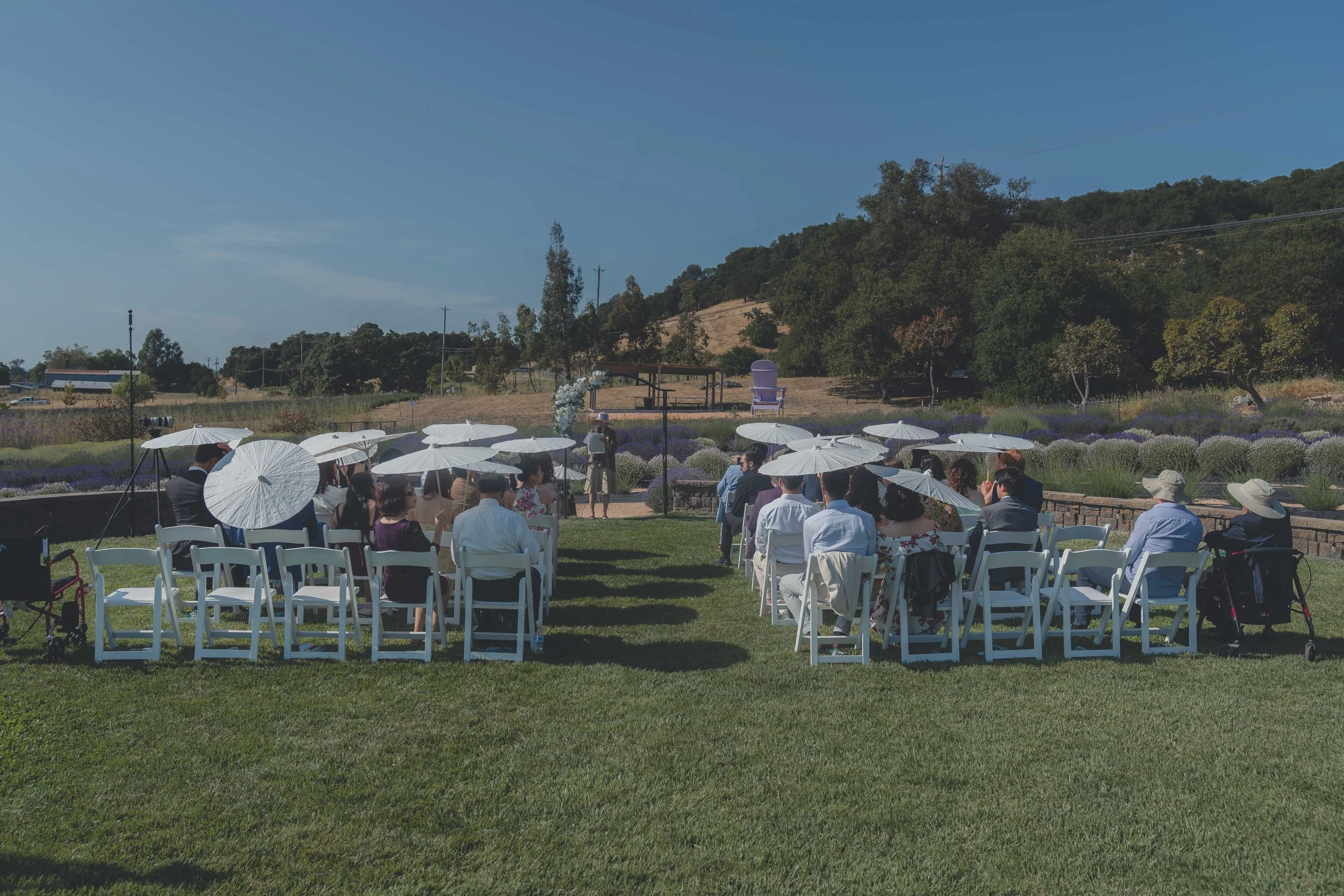 Wide view of the ceremony seating and surrounding landscape at a Sonoma wedding venue.