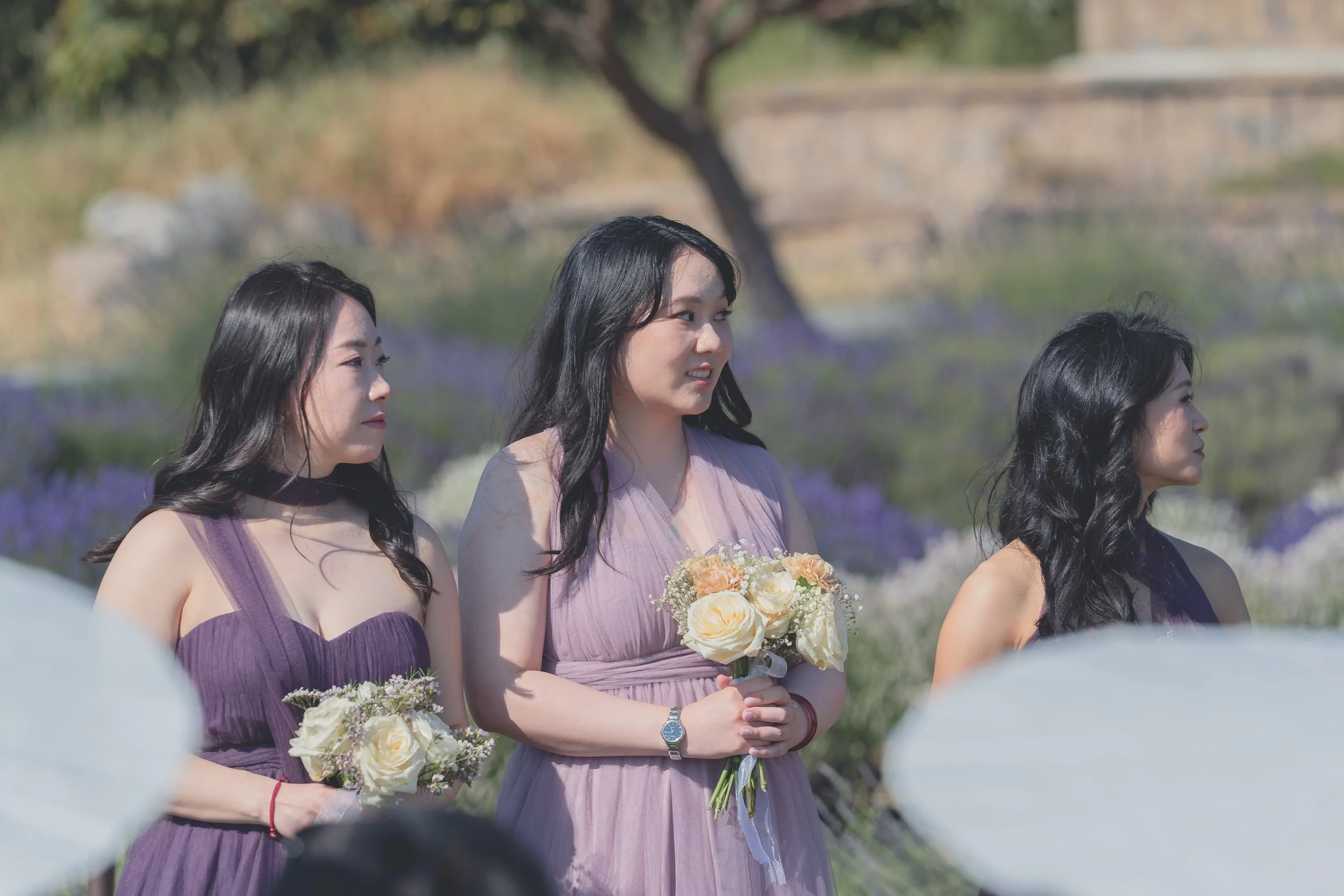 Wedding party members sharing a quiet moment before the ceremony in Sonoma.