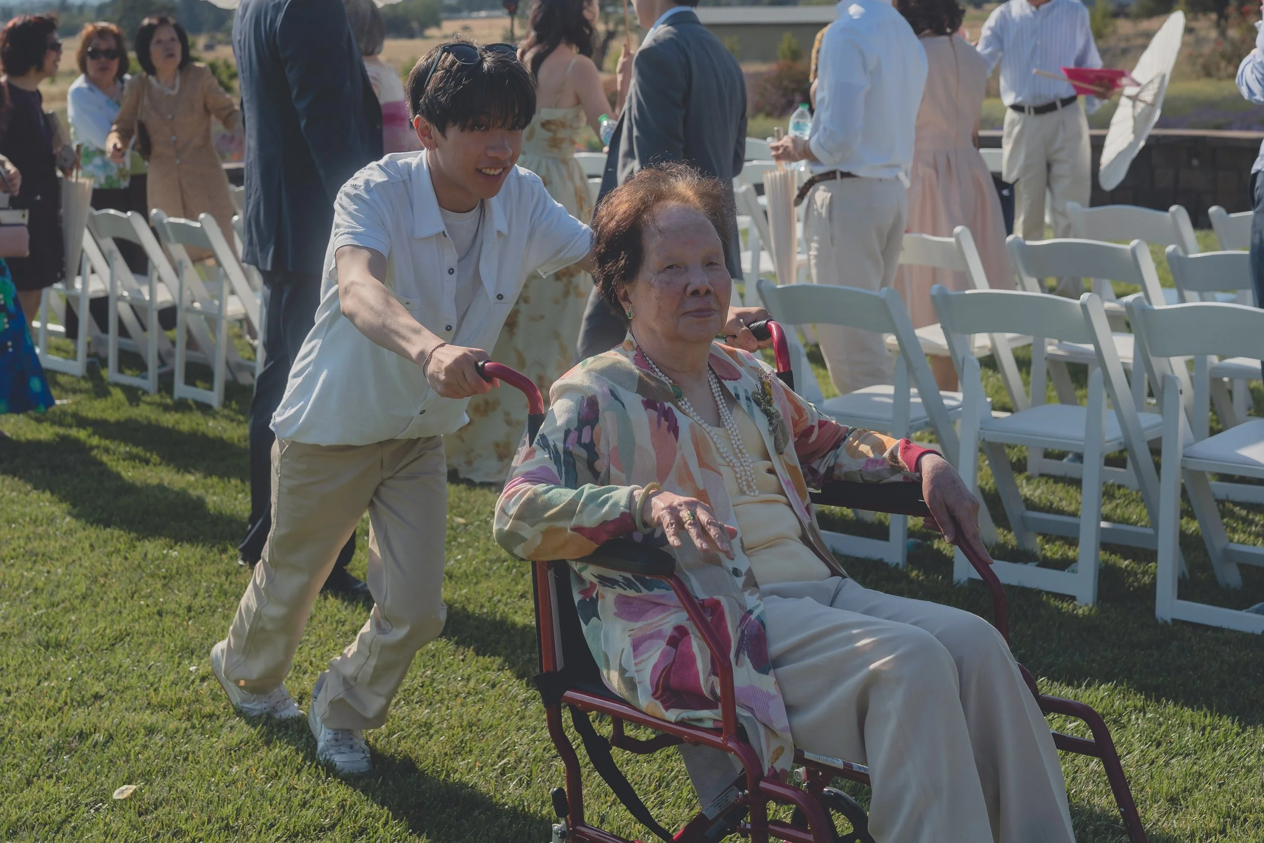 Guests congratulating the couple following Katherine and Calvin’s Sonoma wedding ceremony.