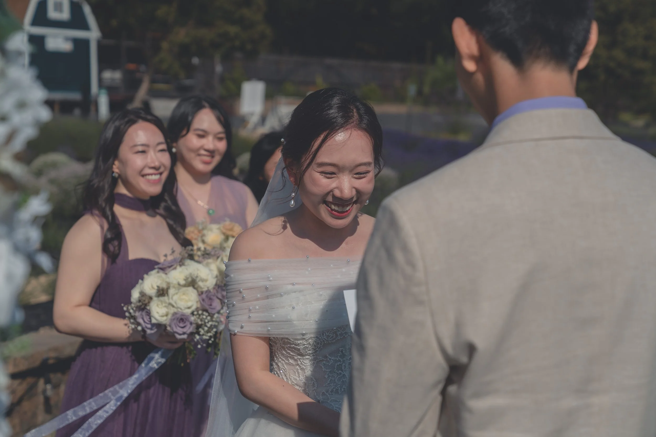 Bride reacting emotionally as vows are exchanged during the Sonoma ceremony.