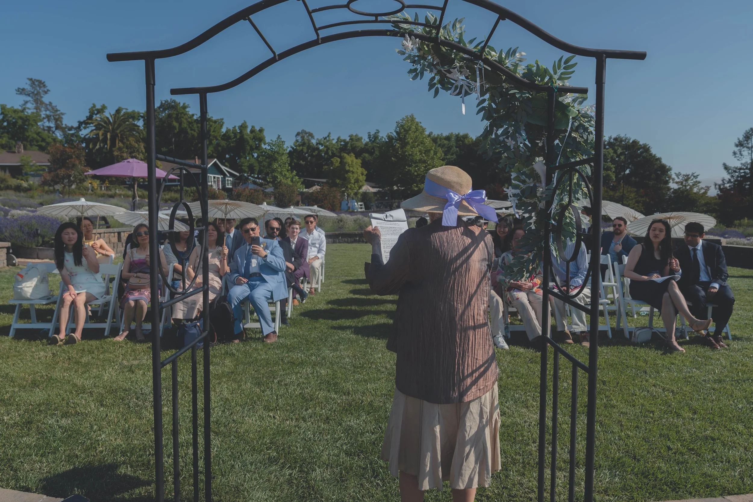 Wide view of the ceremony aisle and guests gathered during Katherine and Calvin’s Sonoma wedding.