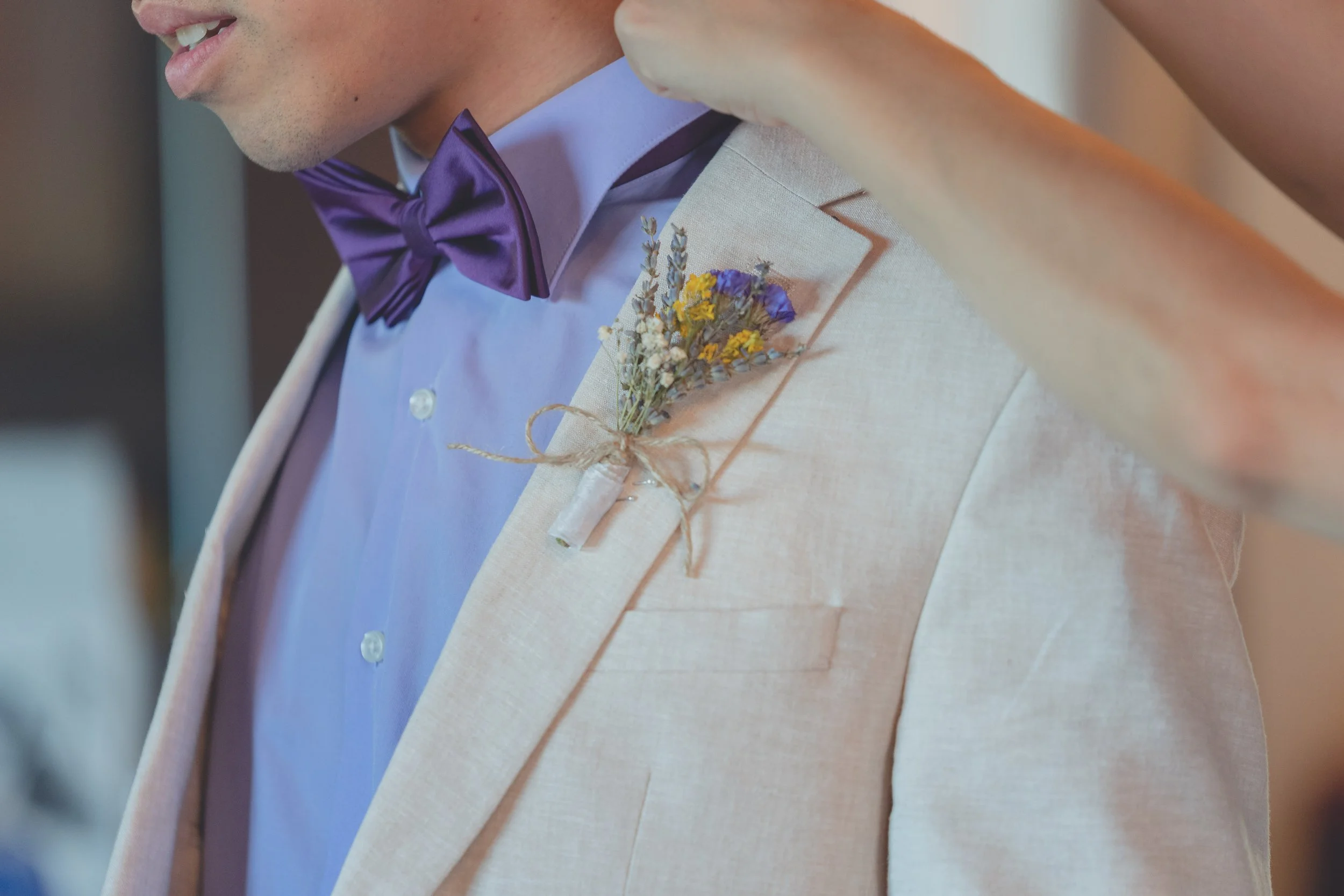 Groom adjusting his jacket before the ceremony at a Sonoma wedding.
