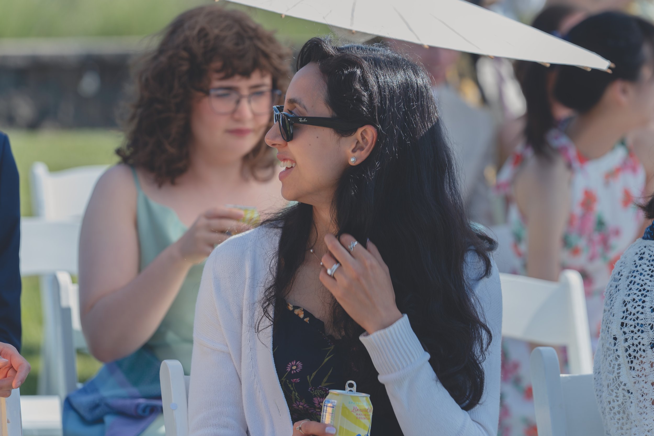 Candid guest interaction captured during Katherine and Calvin’s Sonoma wedding.