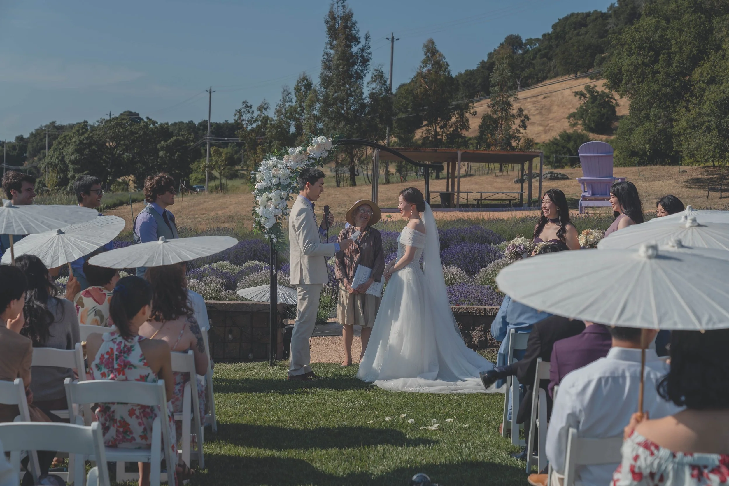 Guests watching the ceremony as vows continue at a Sonoma wedding.