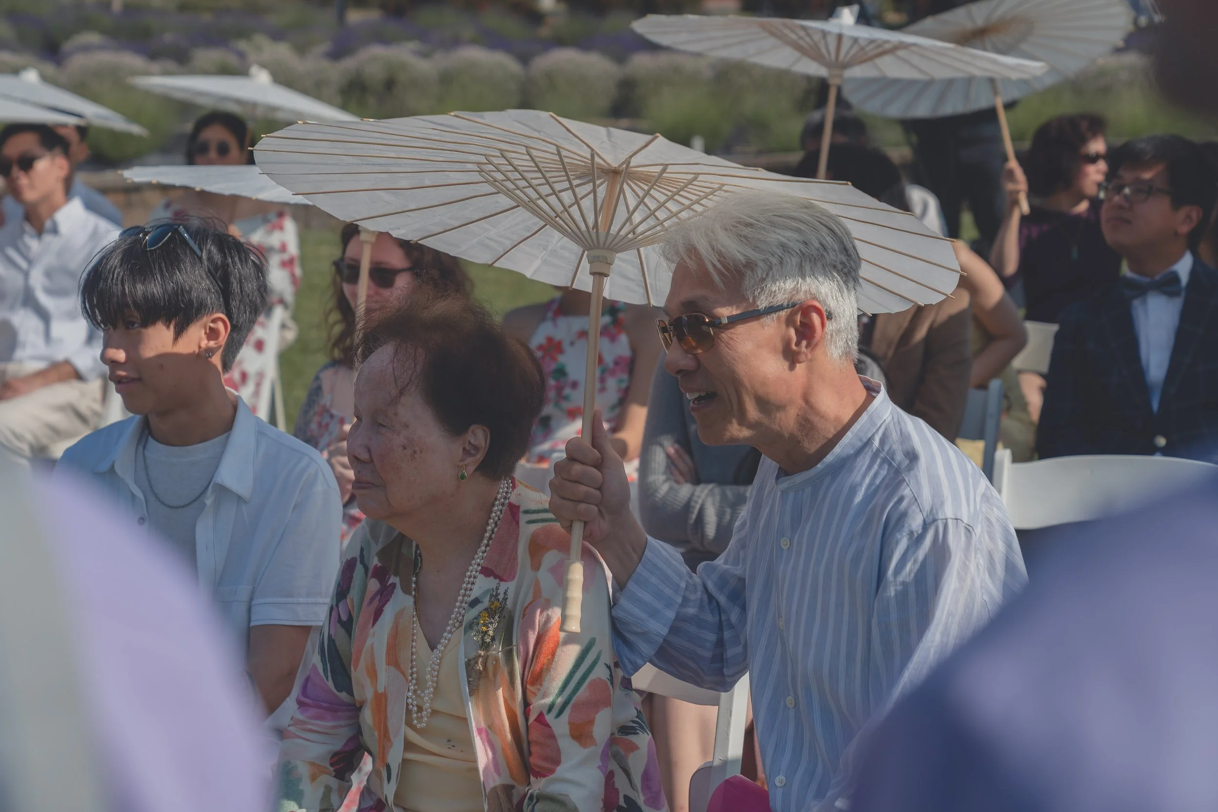 Guests watching attentively as vows are exchanged at a Sonoma wedding.