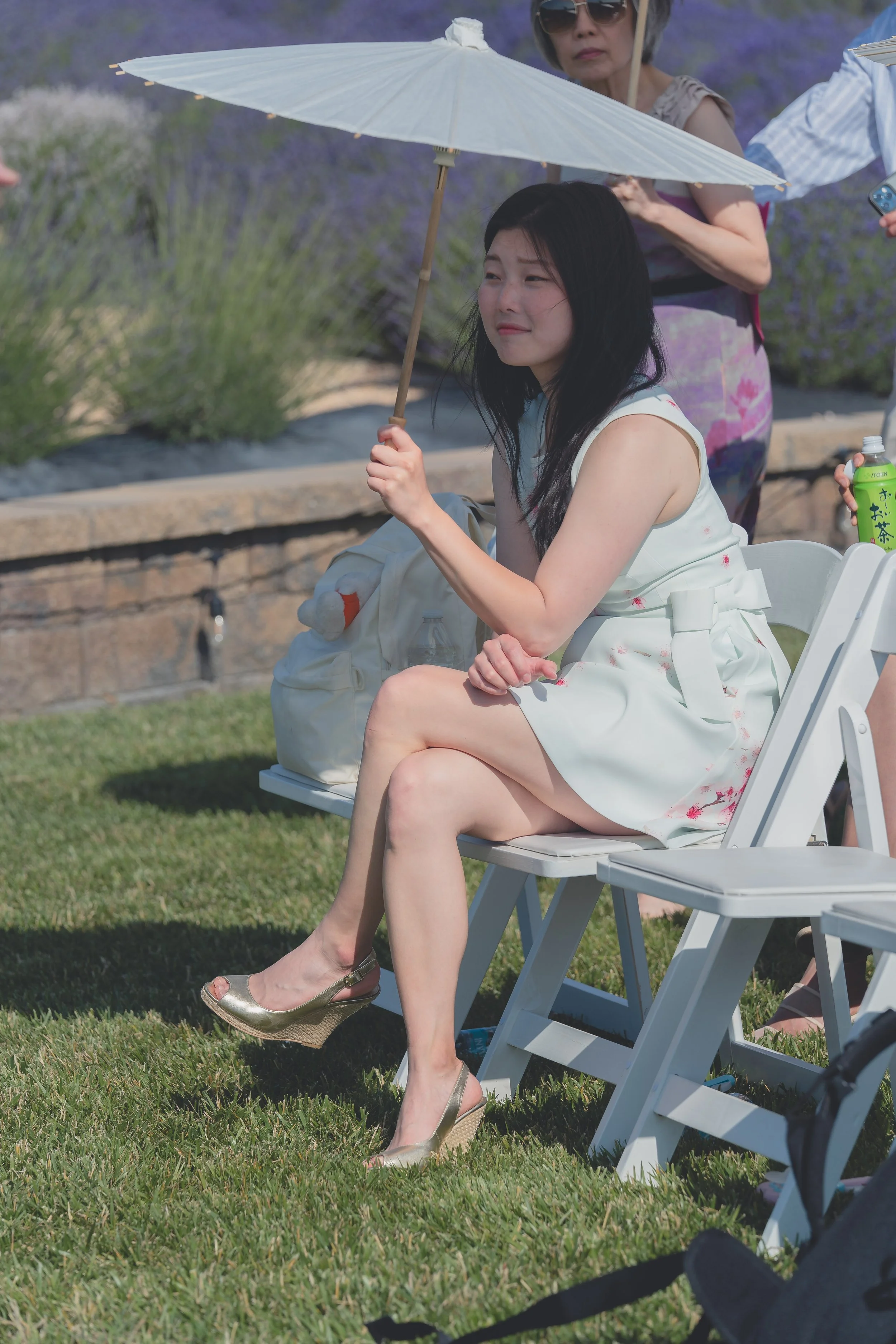 130. Guest seated in the ceremony area, photographed with a documentary approach in Sonoma.
