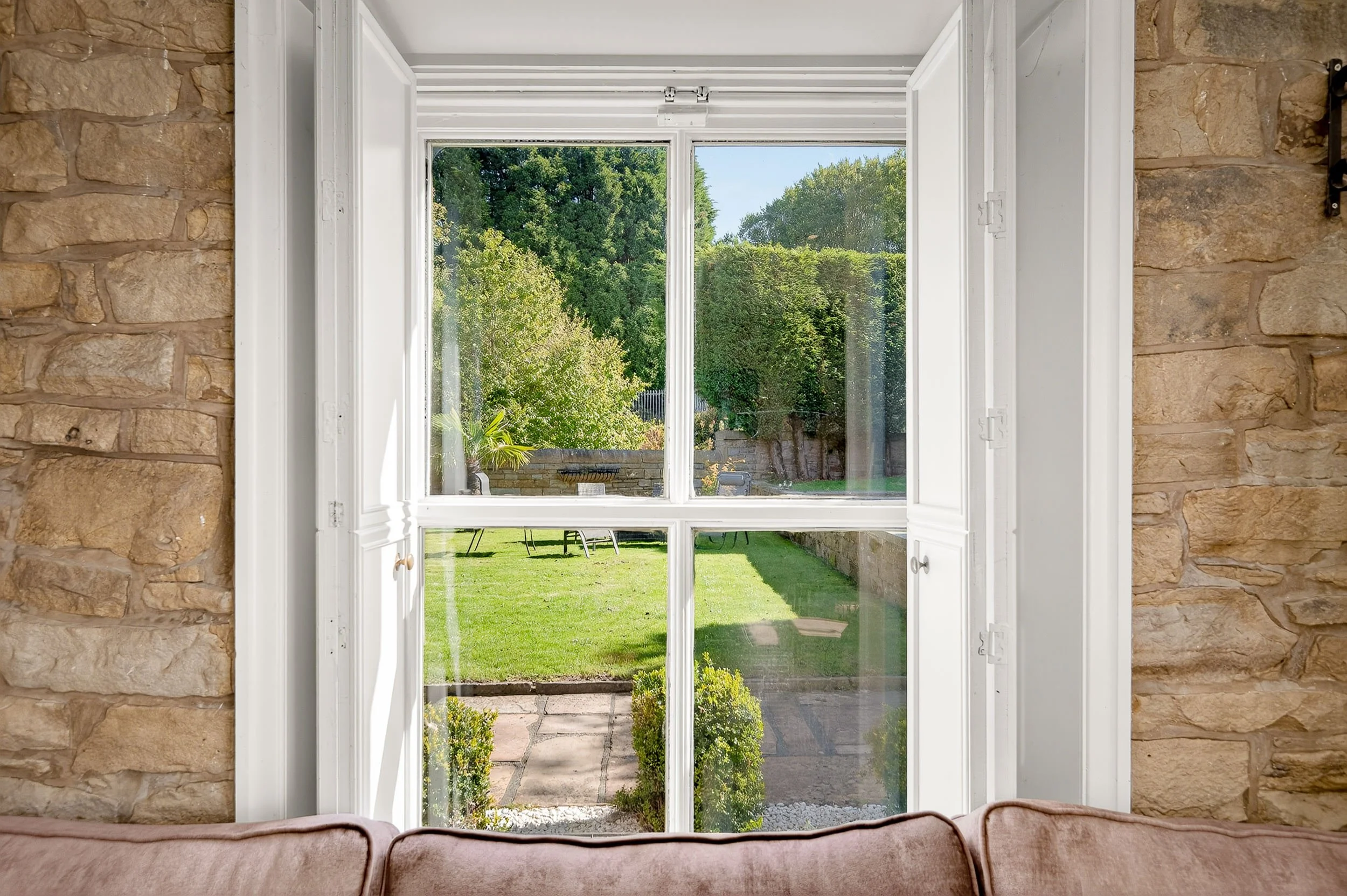 traditional-sash-window-garden-view-stone-surround.jpg