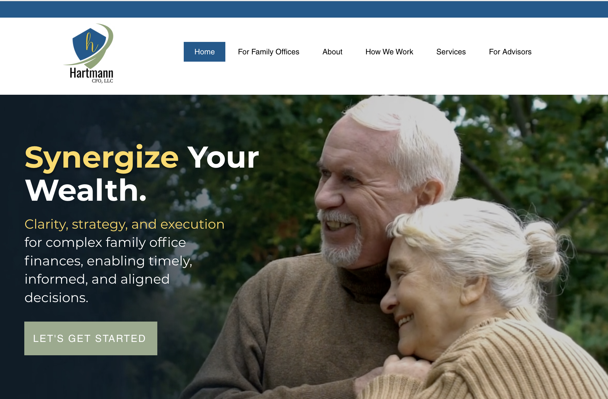 Website homepage for Hartmann CFO LLC featuring a smiling elderly couple outdoors, with the headline 'Synergize Your Wealth' and a call to action button 'Let's Get Started'.