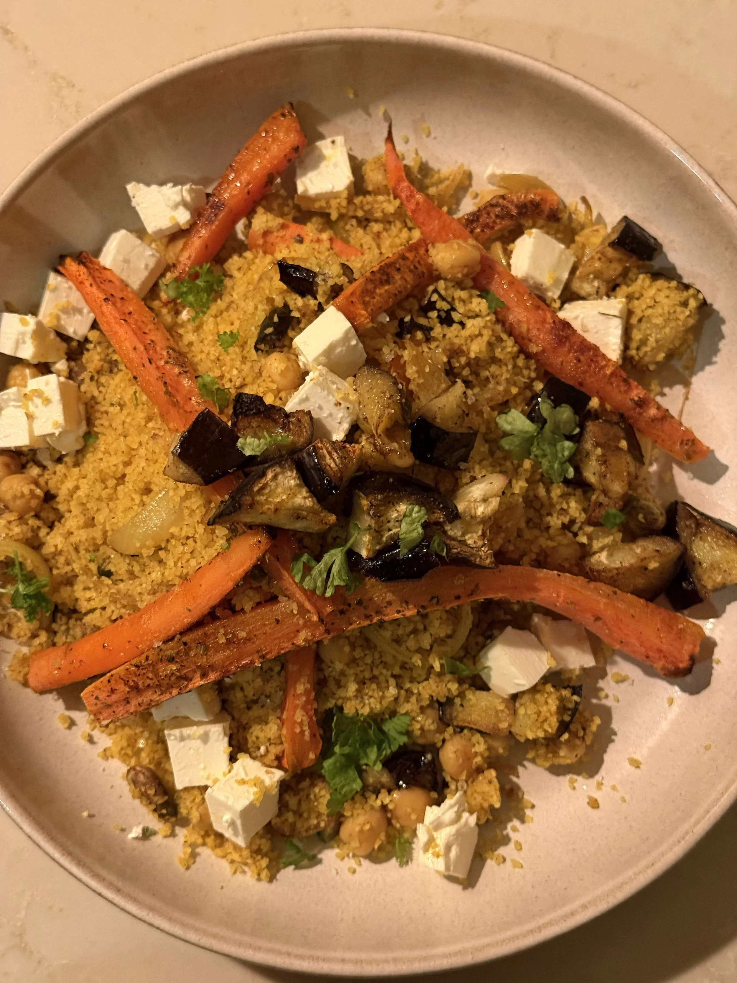 Geroosterde groentecouscous met feta, pistachenoten en citroen