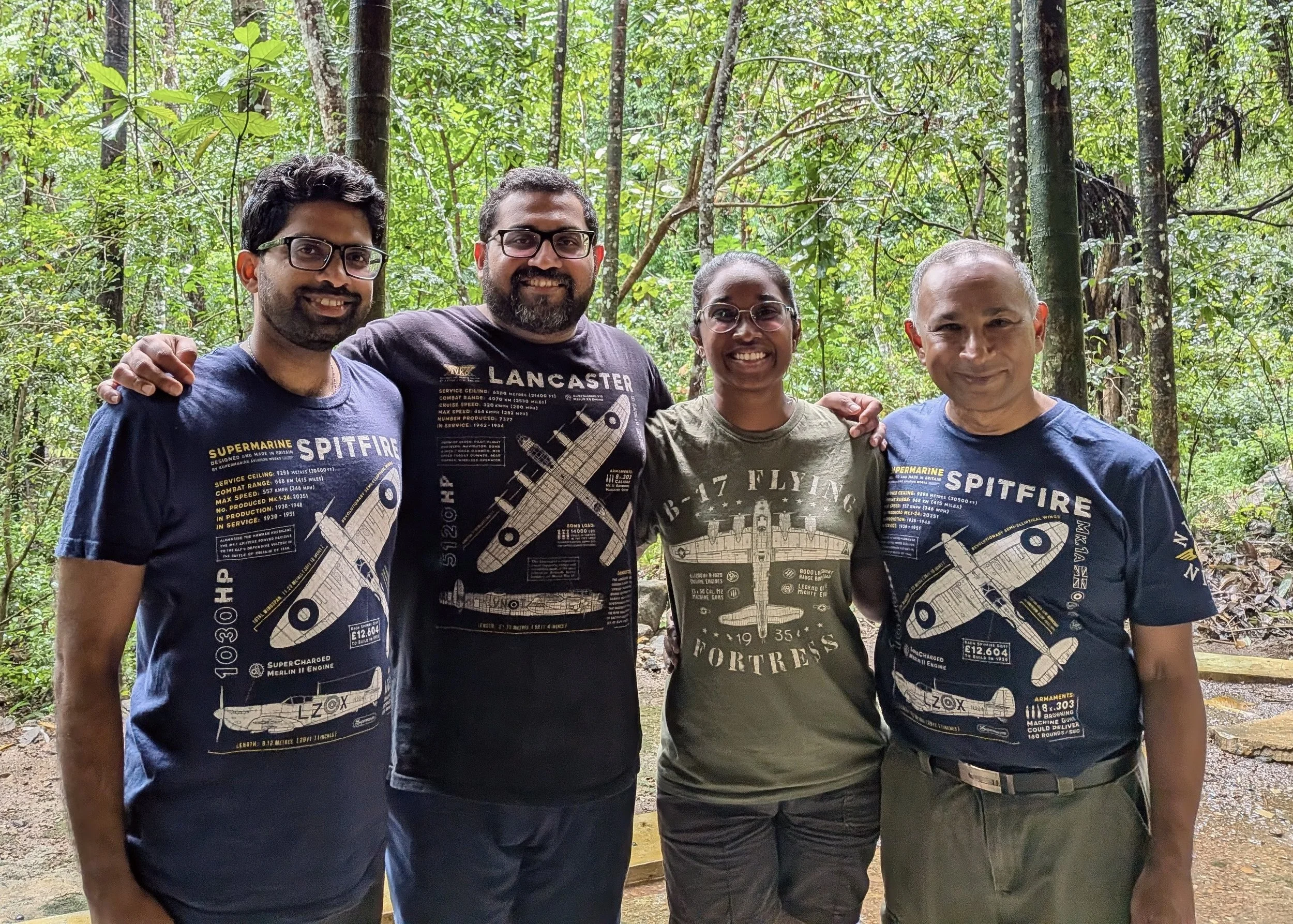 Family with their 909 Apparel Spitfire, Lancaster and B-17 Flying Fortress T-Shirts haul in a beautiful jungle setting in Sri Lanka
