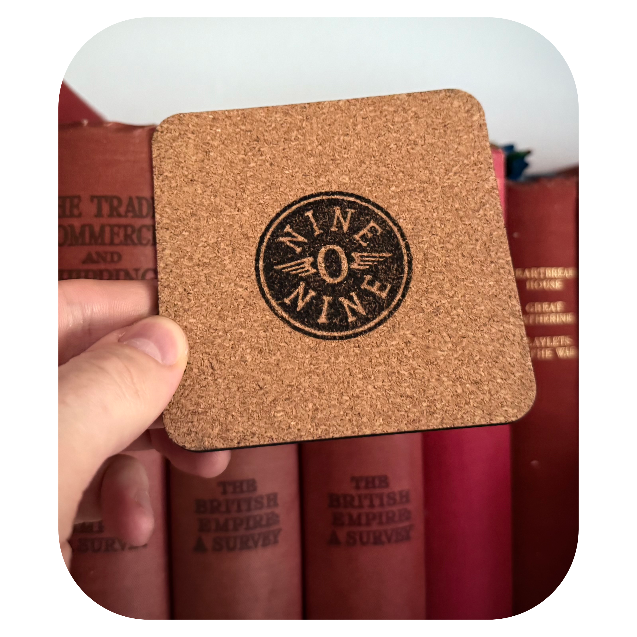 Back of WW2 aviation coaster showing cork backing and 909 Apparel branding