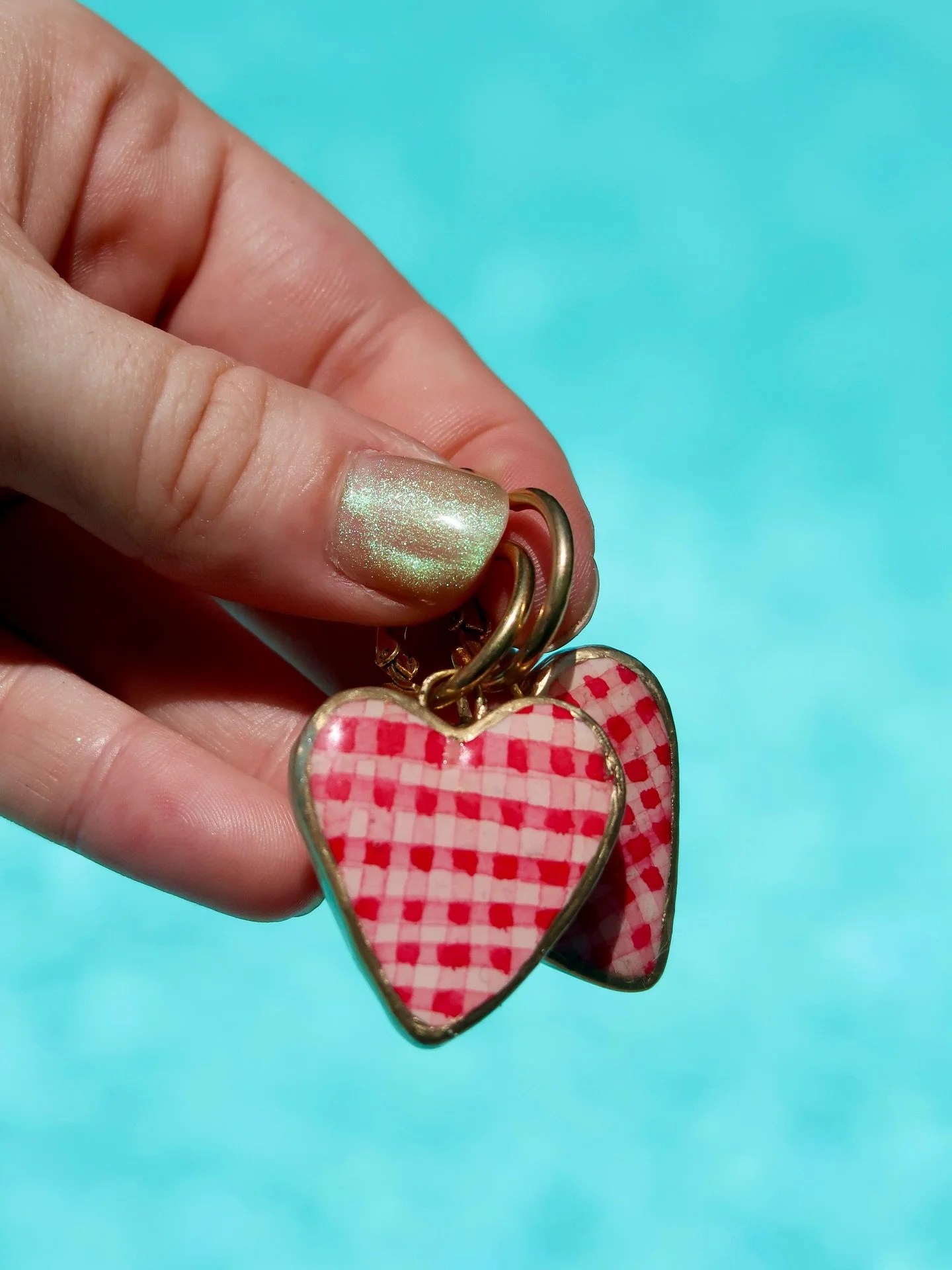 Swipe to see some new green &amp; blue gingham heart charms - some of my favs to style 💚

_________

#jewelry #handmadejewelry #earrings #earring #earringmaking #photocharm #Clay #crawfish #crawfishcollections #polymerclayjewelry #painting #collage 