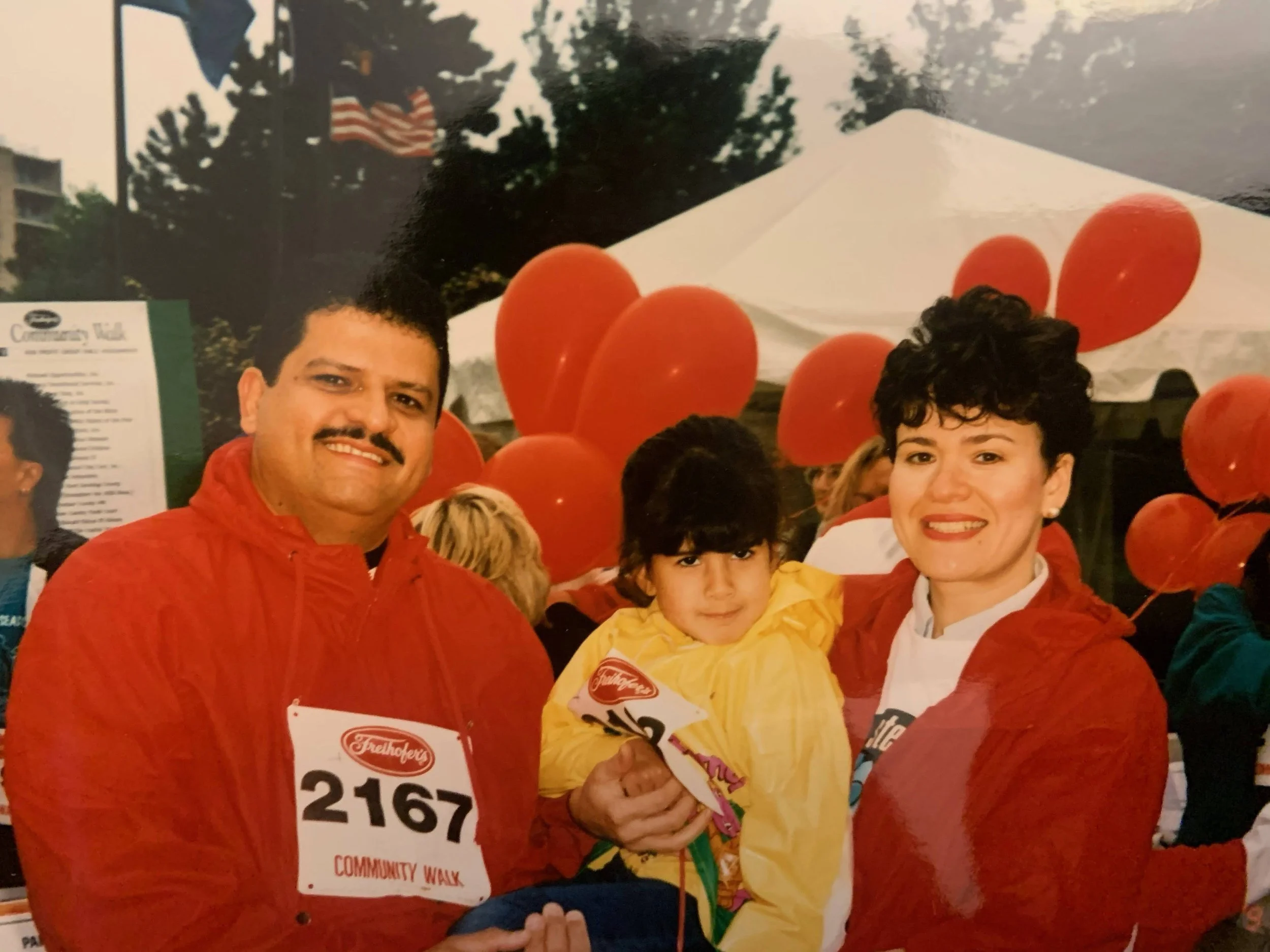 Gabriella Romero with her parents as a child
