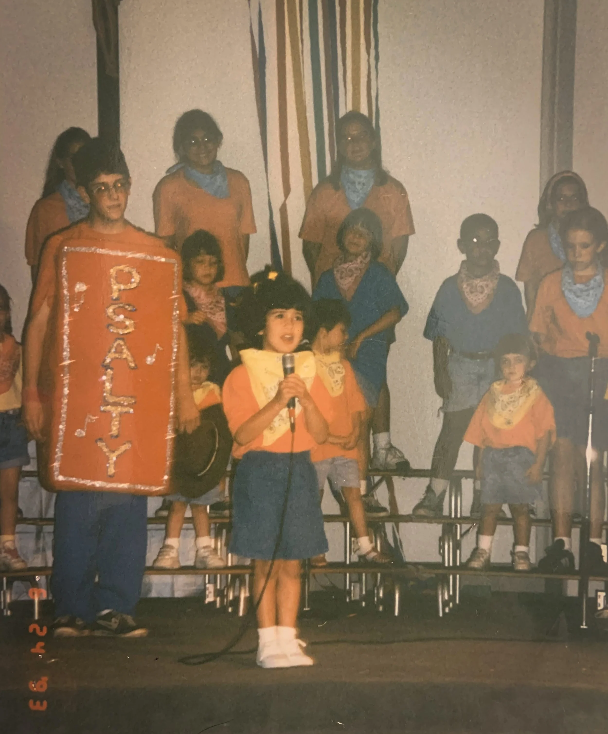 Gabriella Romero on stage as a child