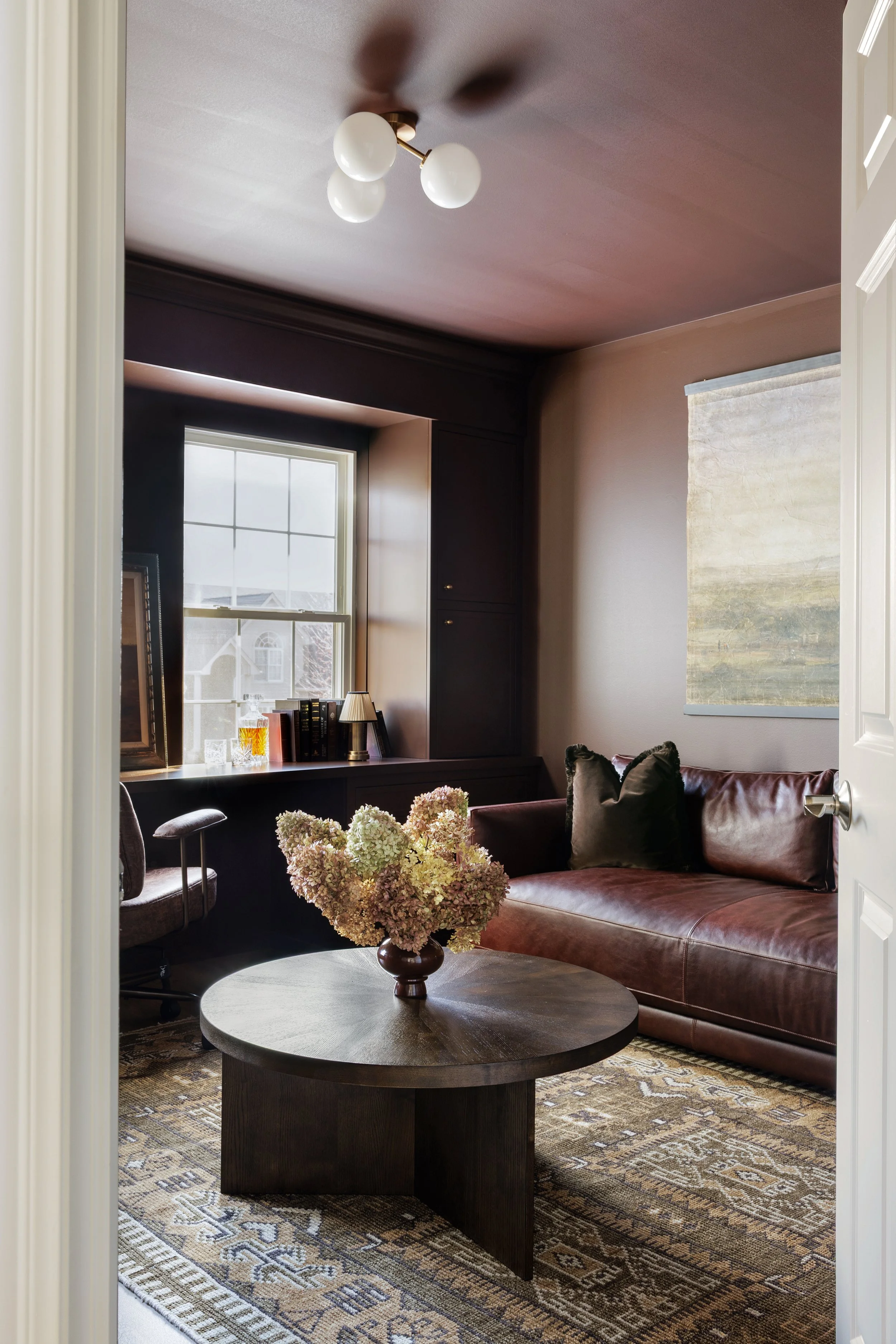 Moody home office with custom built-ins and color drenched trend space by Naperville interior designer