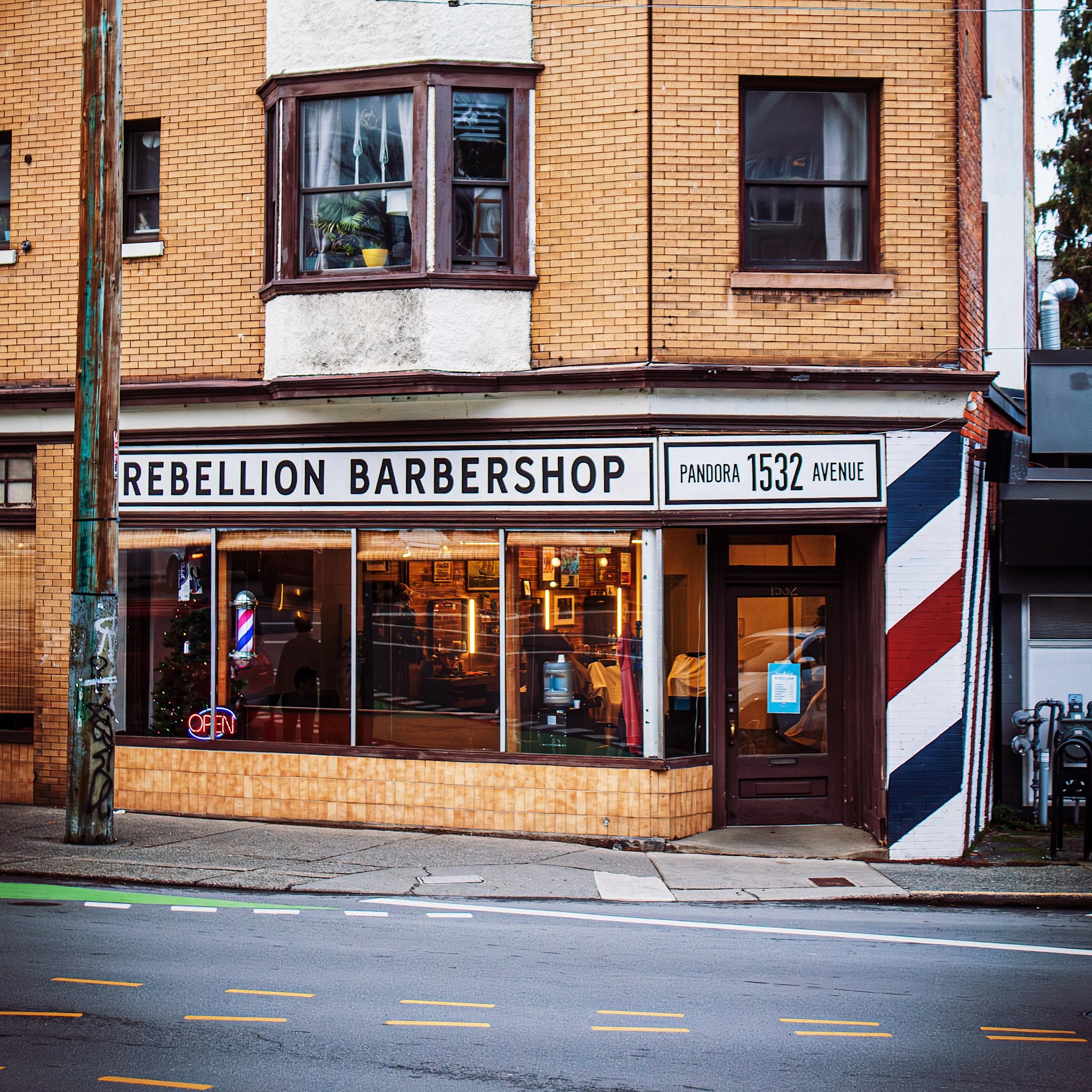 The outside of Rebellion Barbershop located on Pandora Ave, in Victoria BC, where you can purchase 1630 essential oil scent.