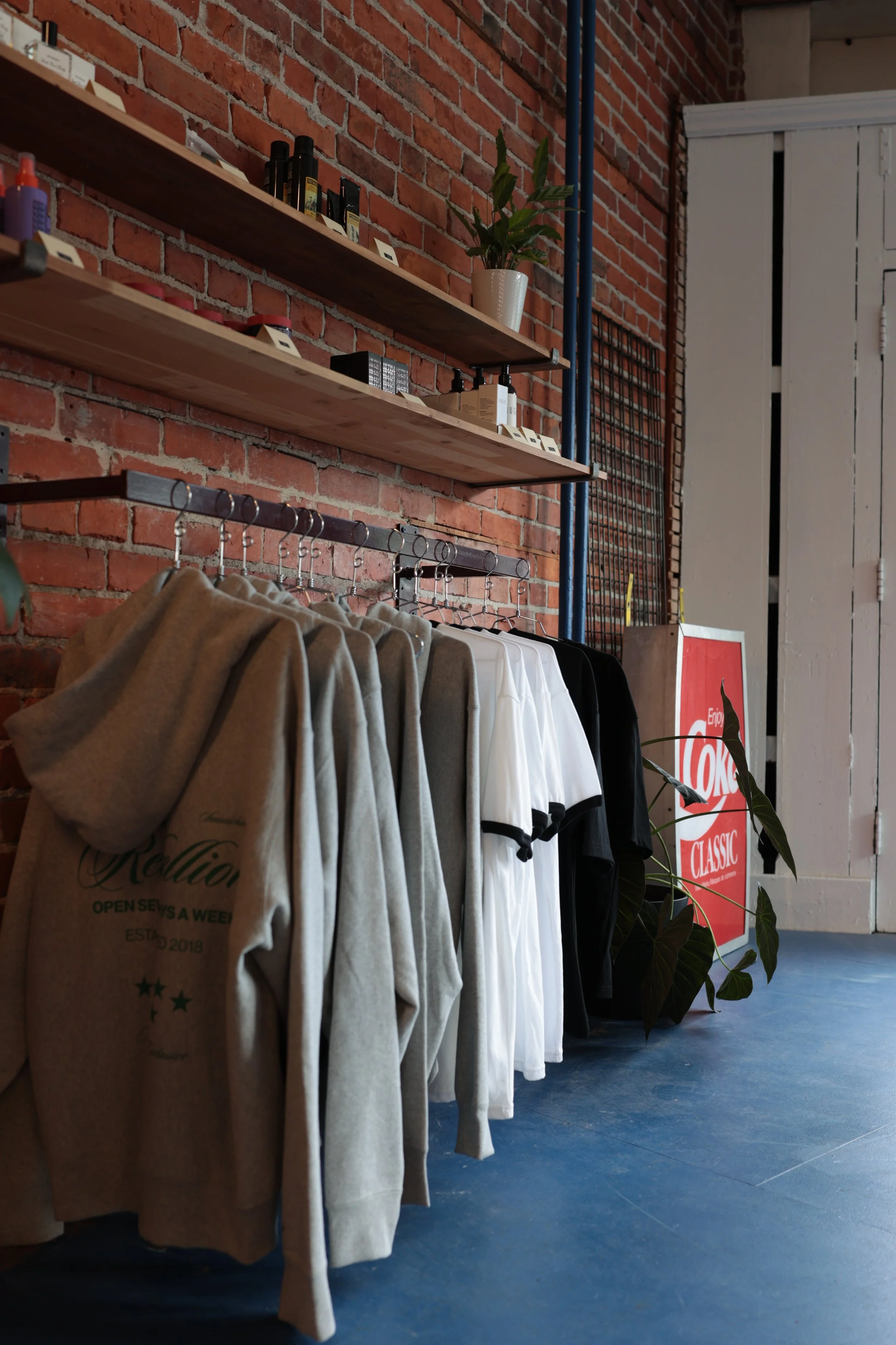 Rebellion Barbershop products and apparel