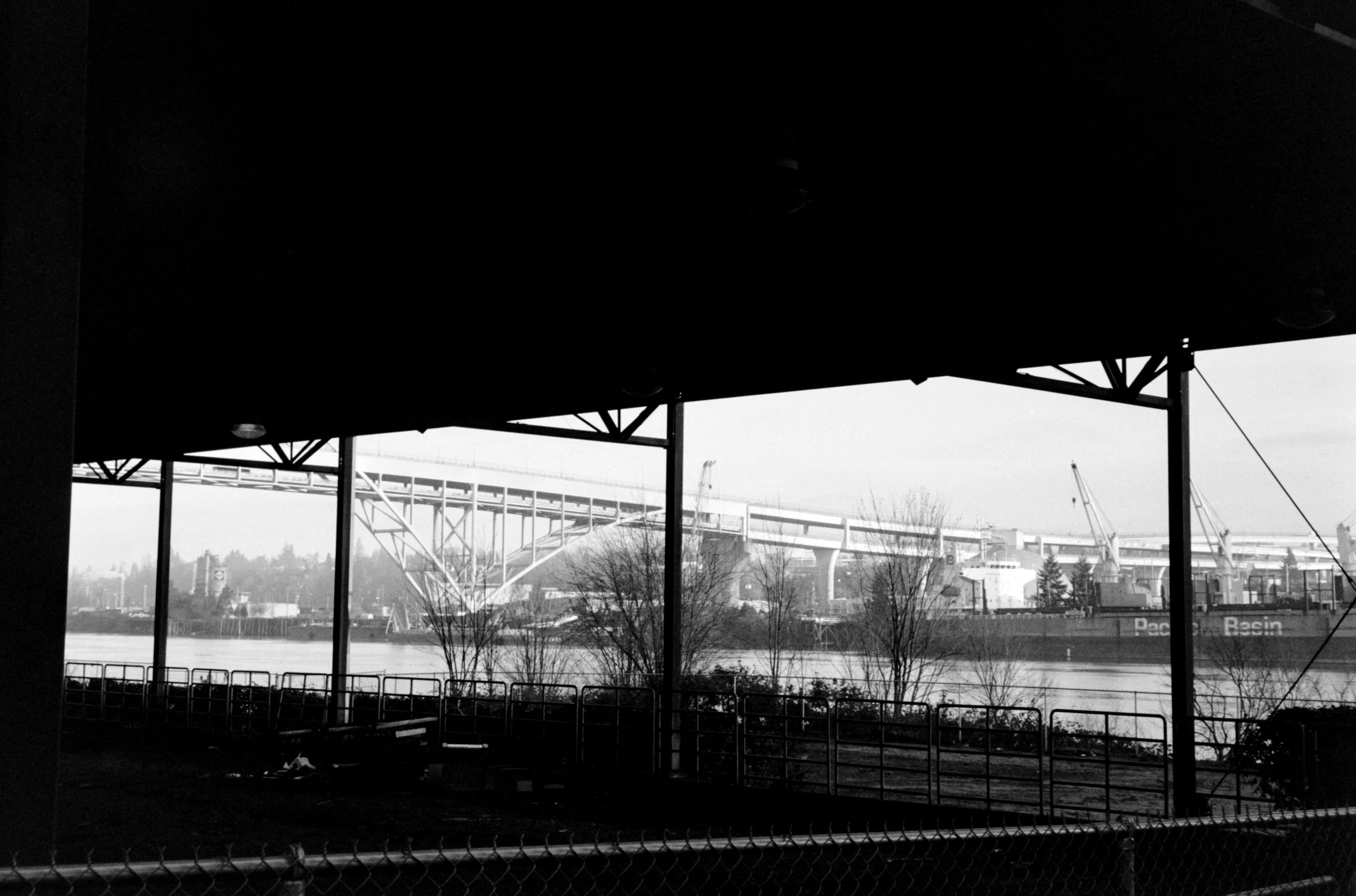 Bright bridge and ship through abandoned lot with cover.jpg