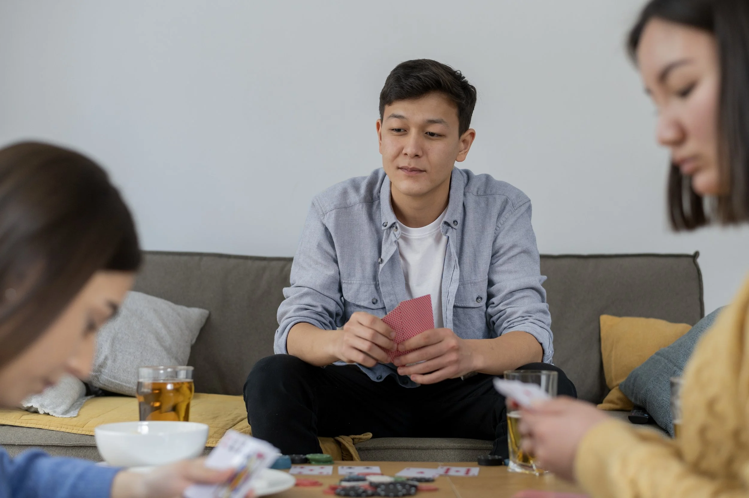 Person experiencing stress and turning to unhealthy coping behaviors.