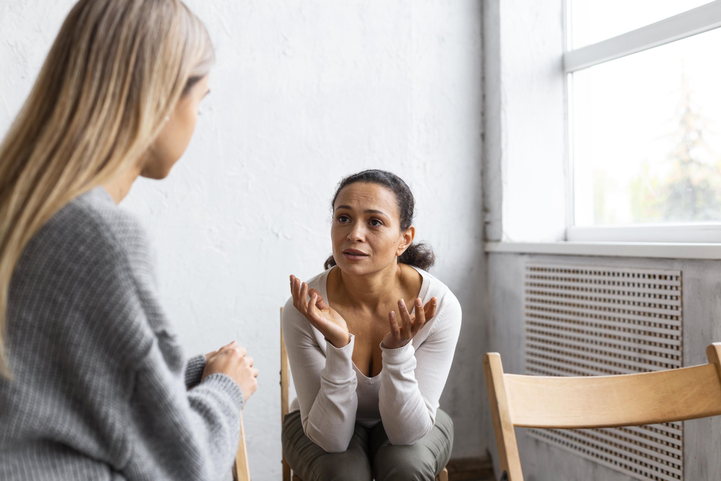 Client learning coping strategies during therapy session for depression.