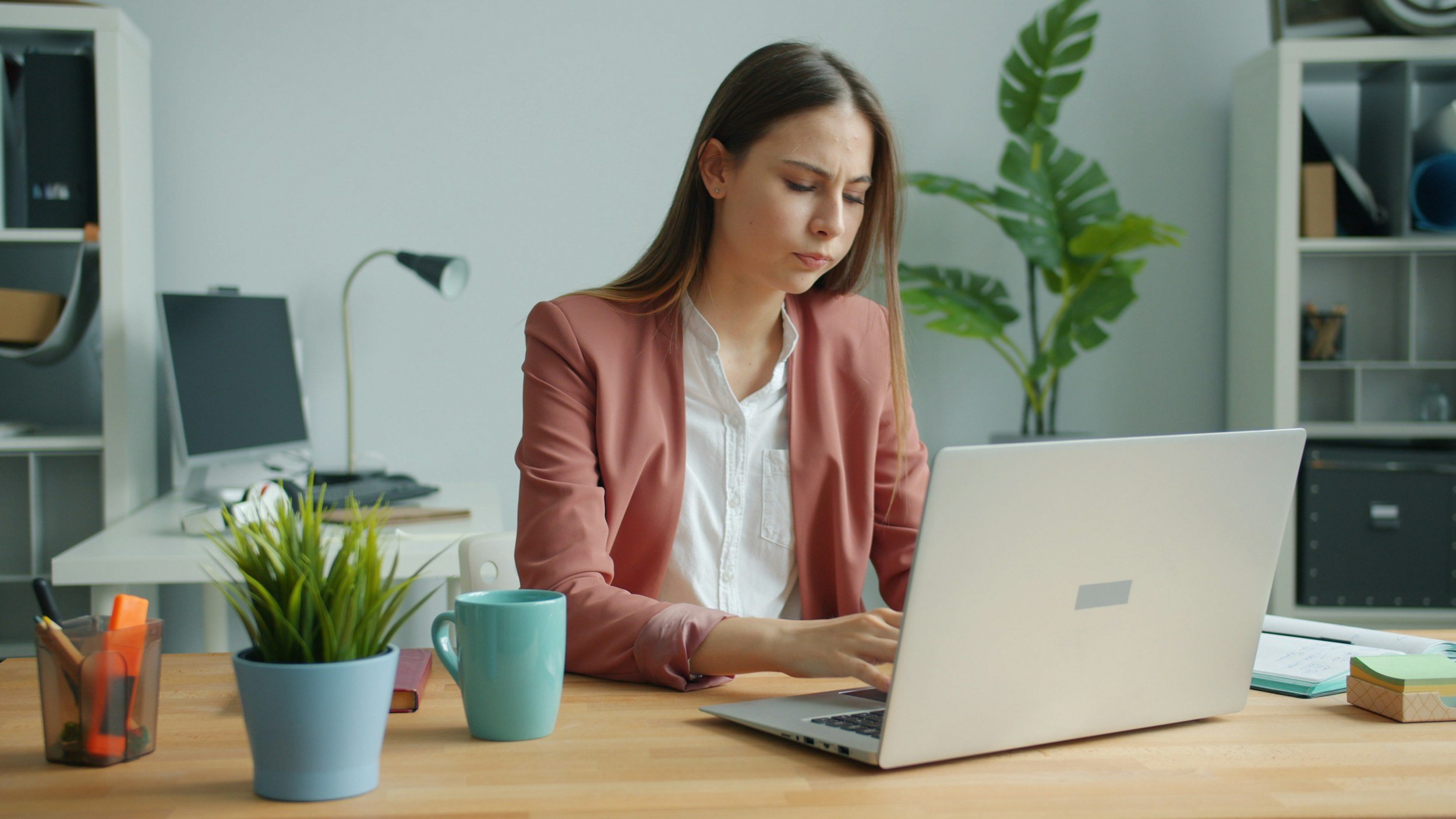 Person struggling with anxiety and physical tension linked to stress response.