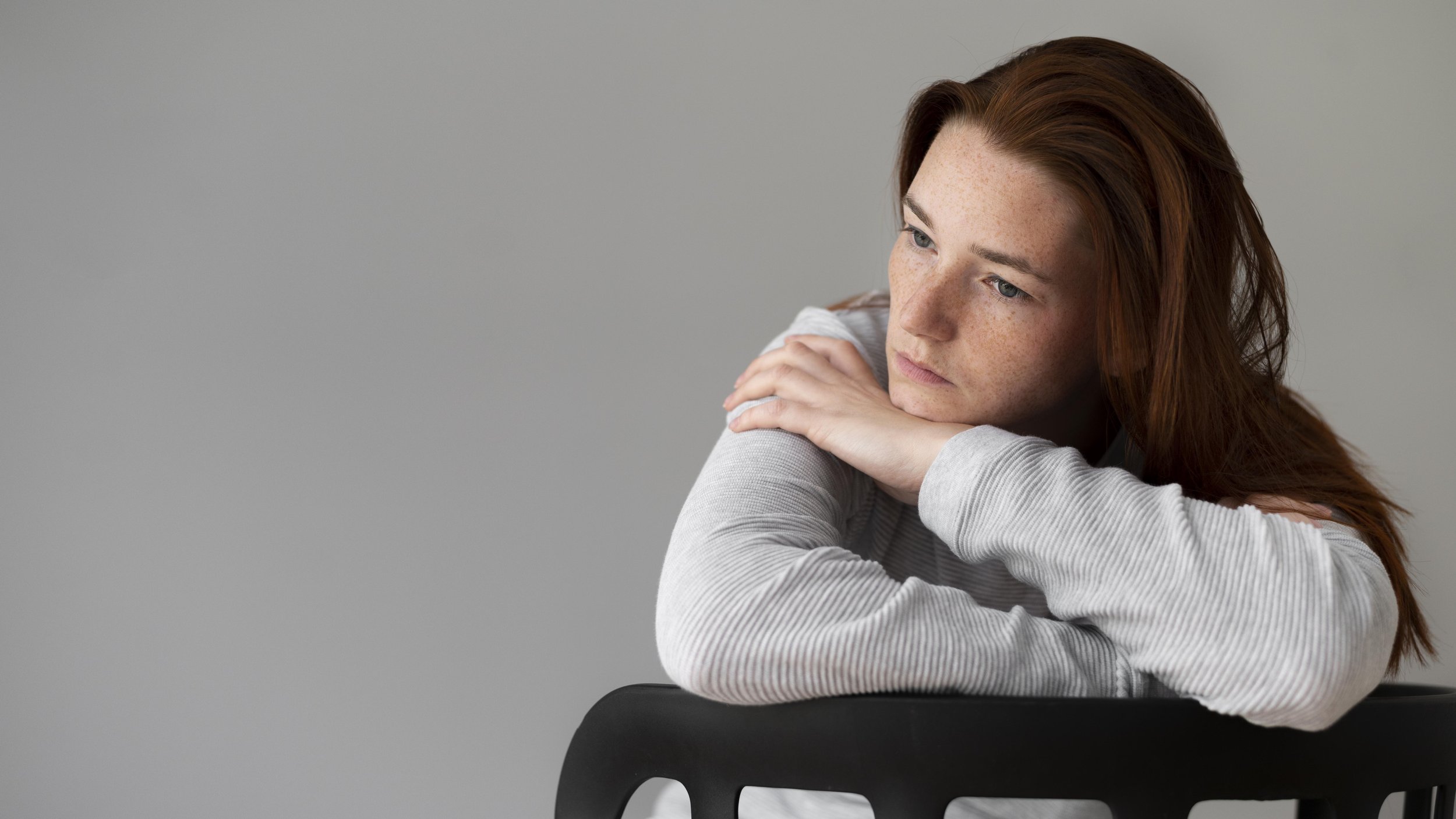 Person struggling with low energy and fatigue related to depression symptoms.
