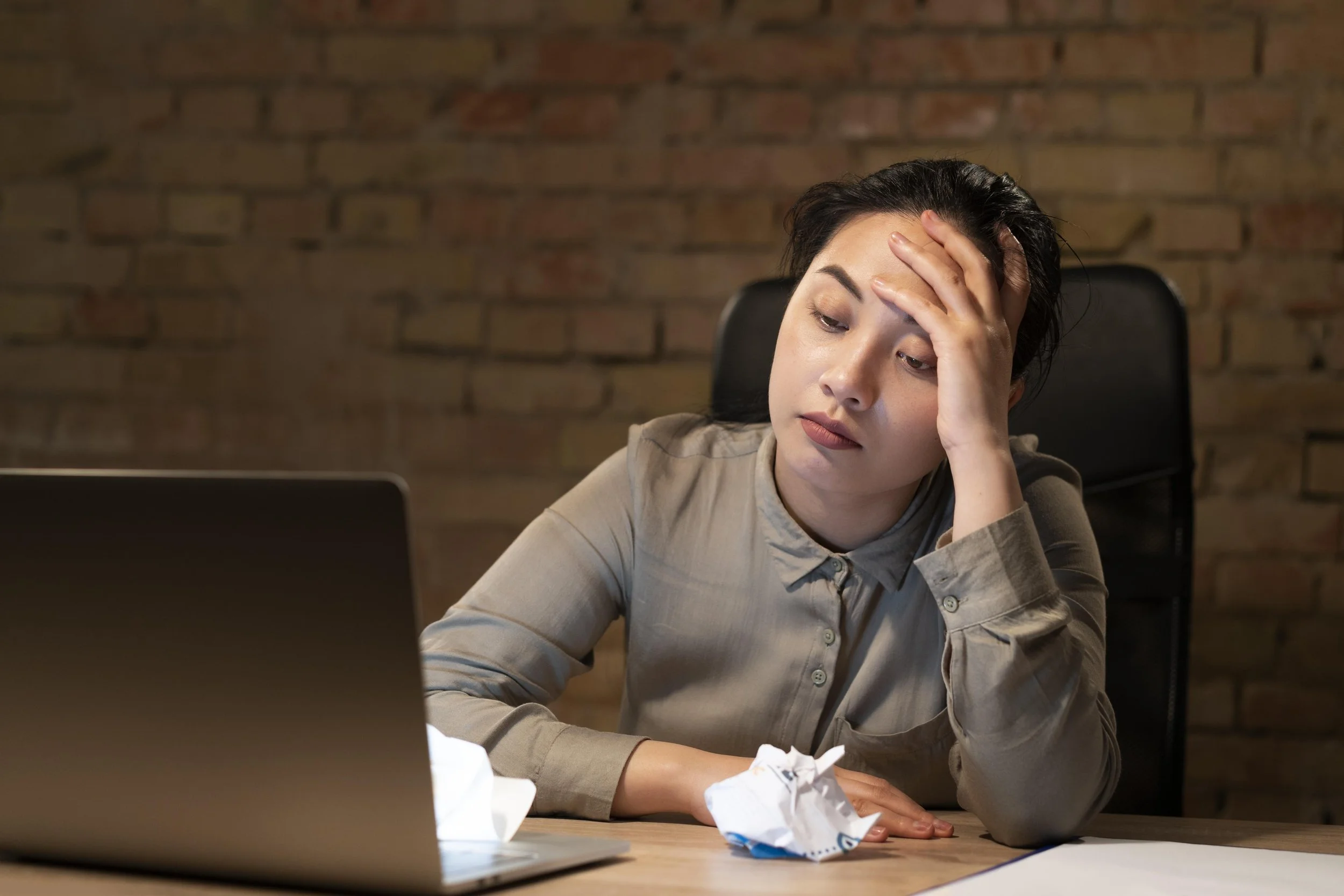 Individual experiencing unwanted thoughts and emotional discomfort.