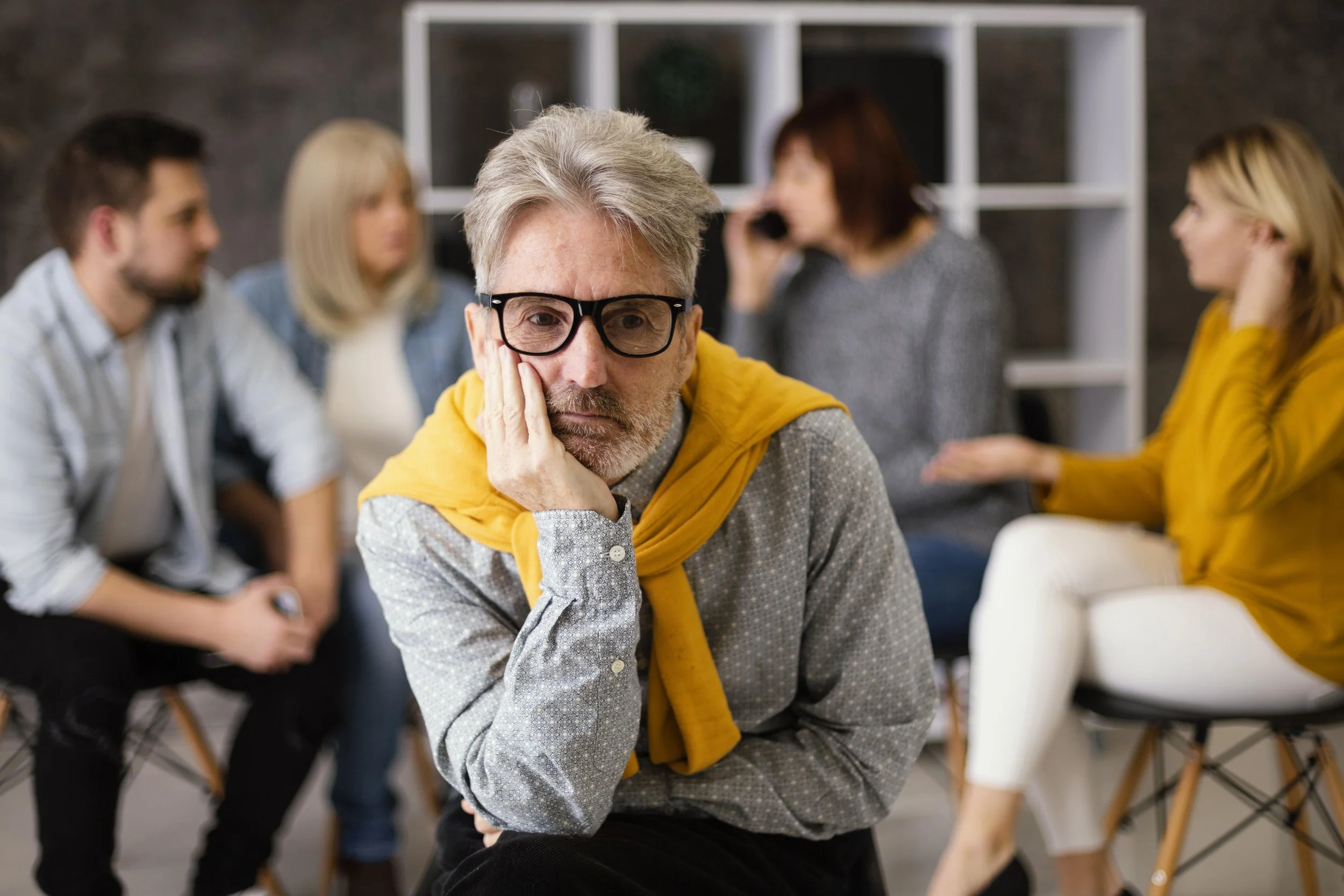 Individual reacting negatively during emotional stress related to ADHD symptoms.