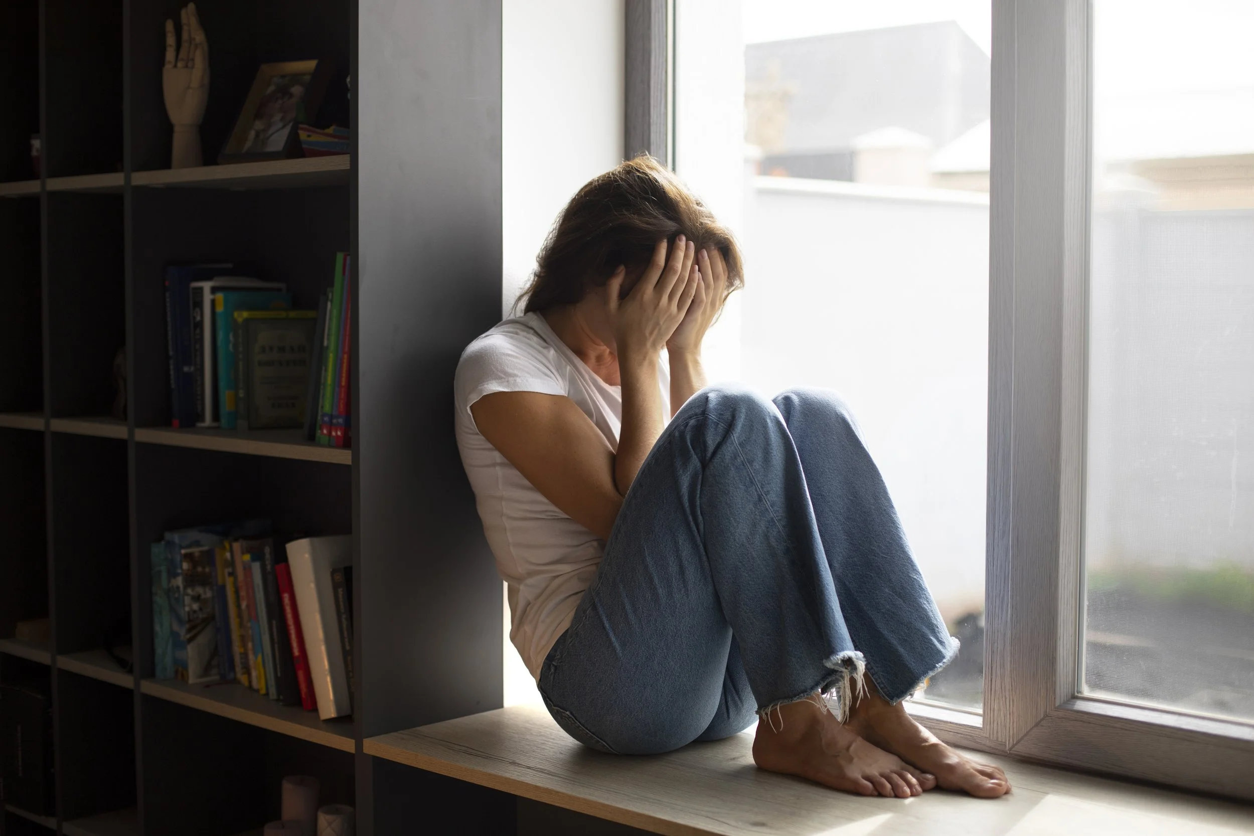Individual struggling with trust and vulnerability because of past trauma.