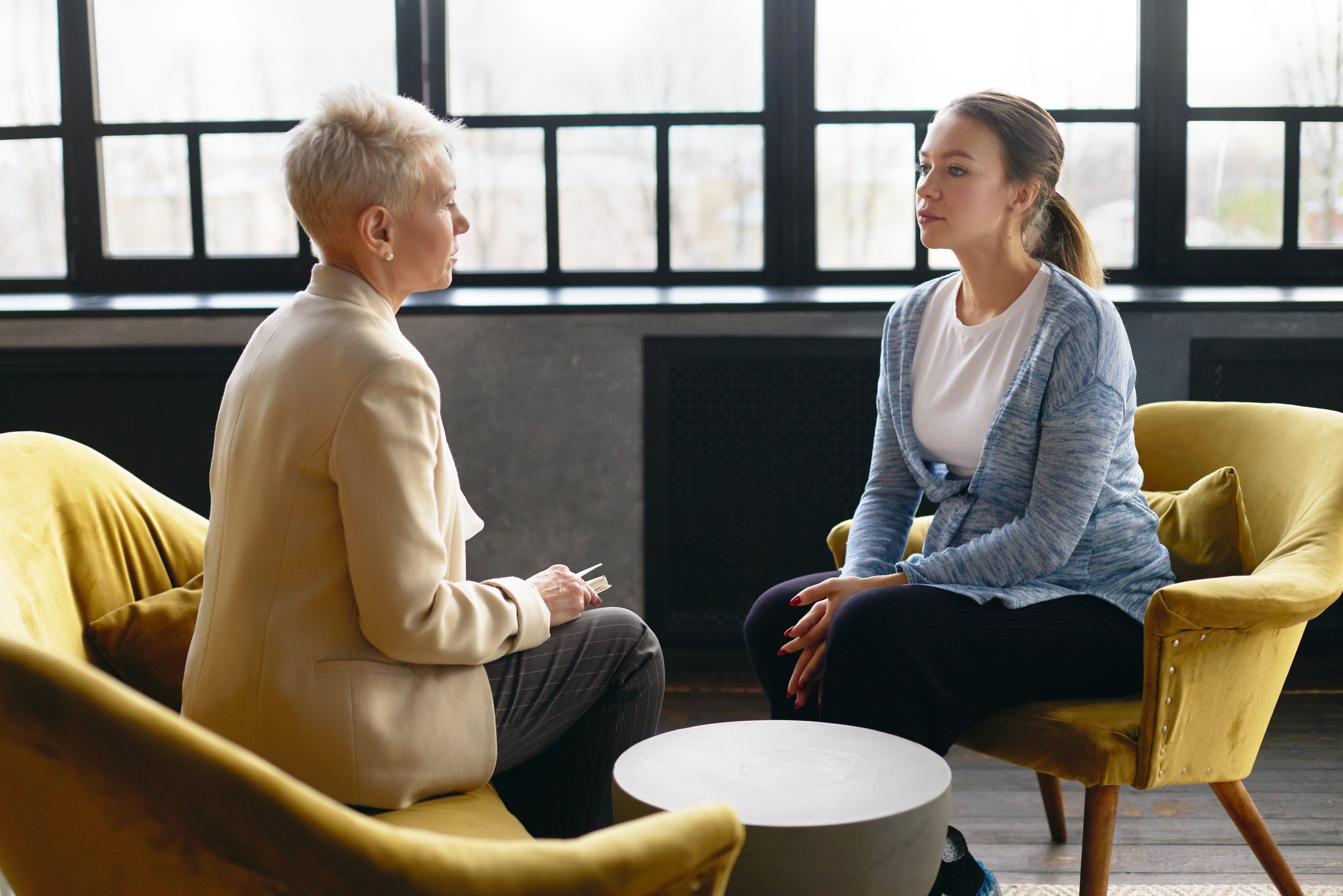 Individual feeling overwhelmed while searching for the right mental health support.