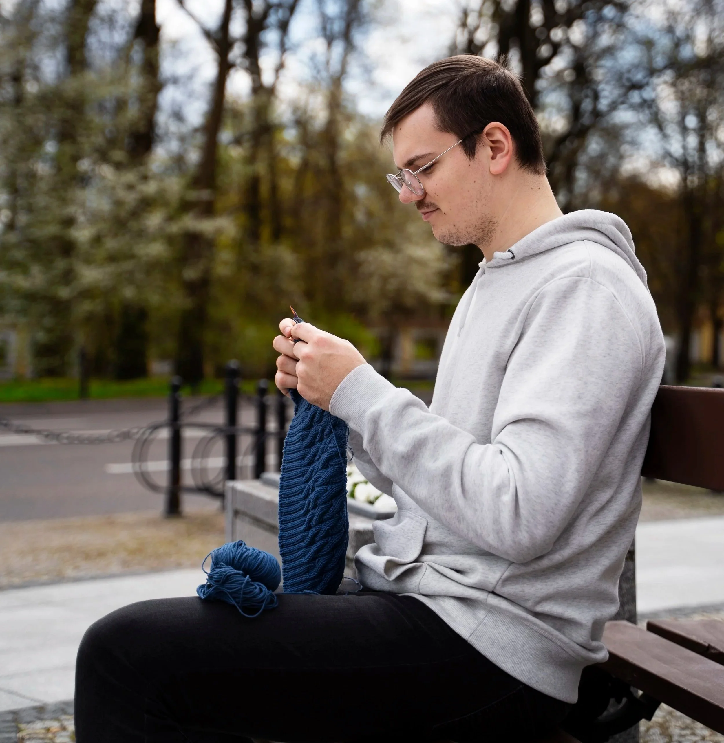 Male client seeking practical therapy solutions for anxiety and emotional stress.