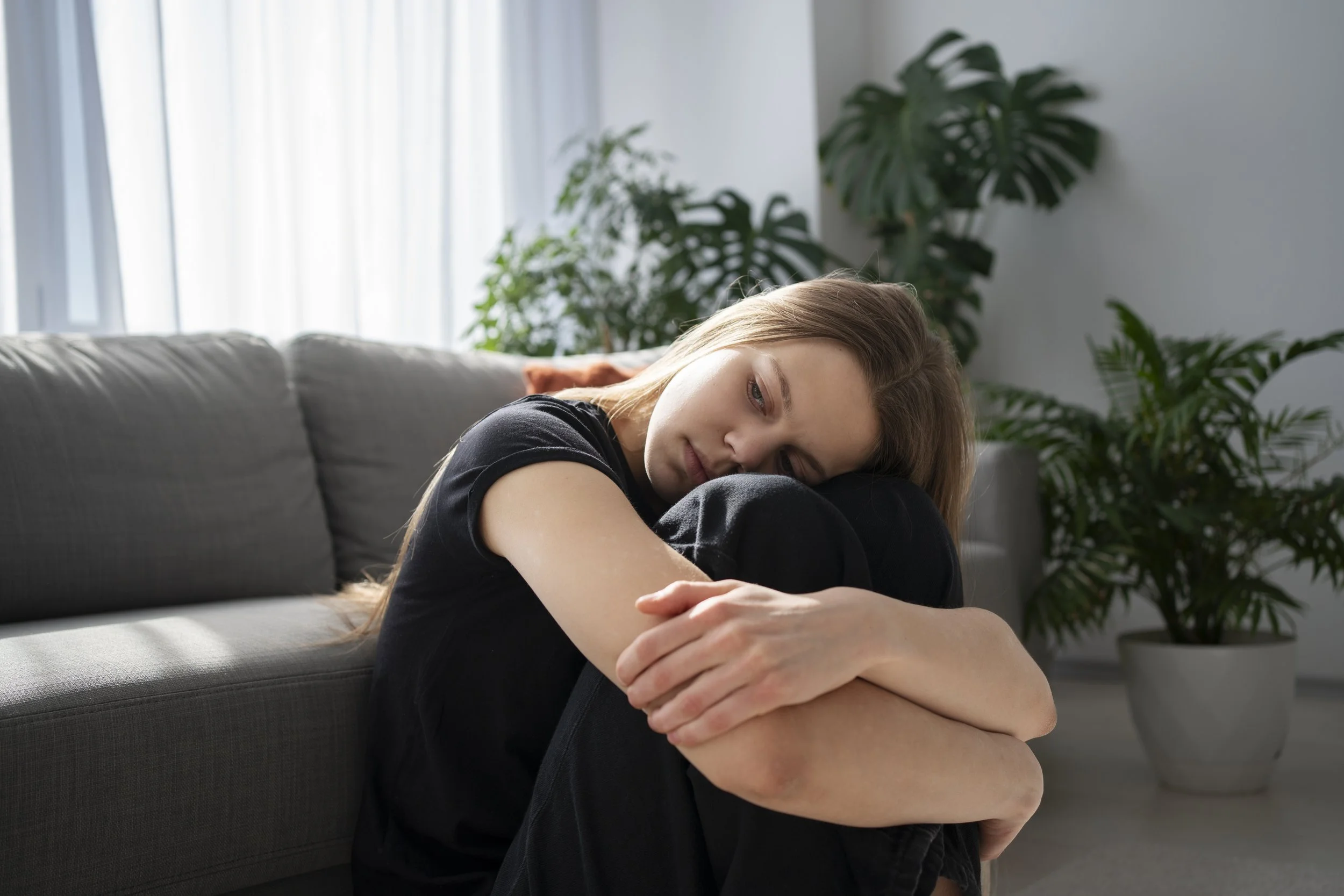 Person appearing productive but feeling emotionally disconnected and overwhelmed inside.