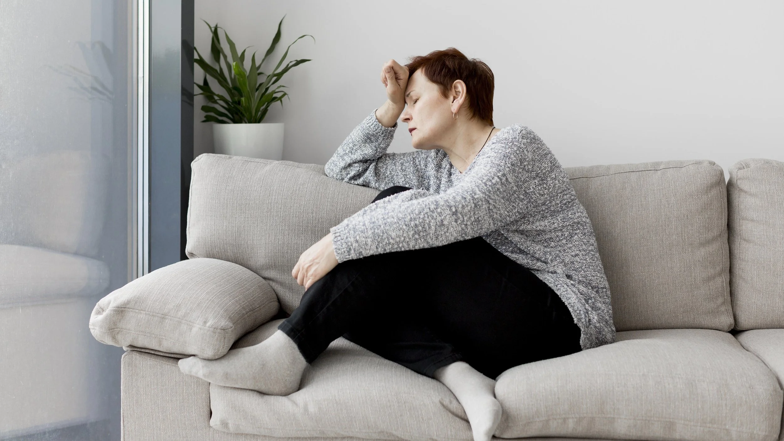 Person appearing easily frustrated and emotionally overwhelmed during daily stress.