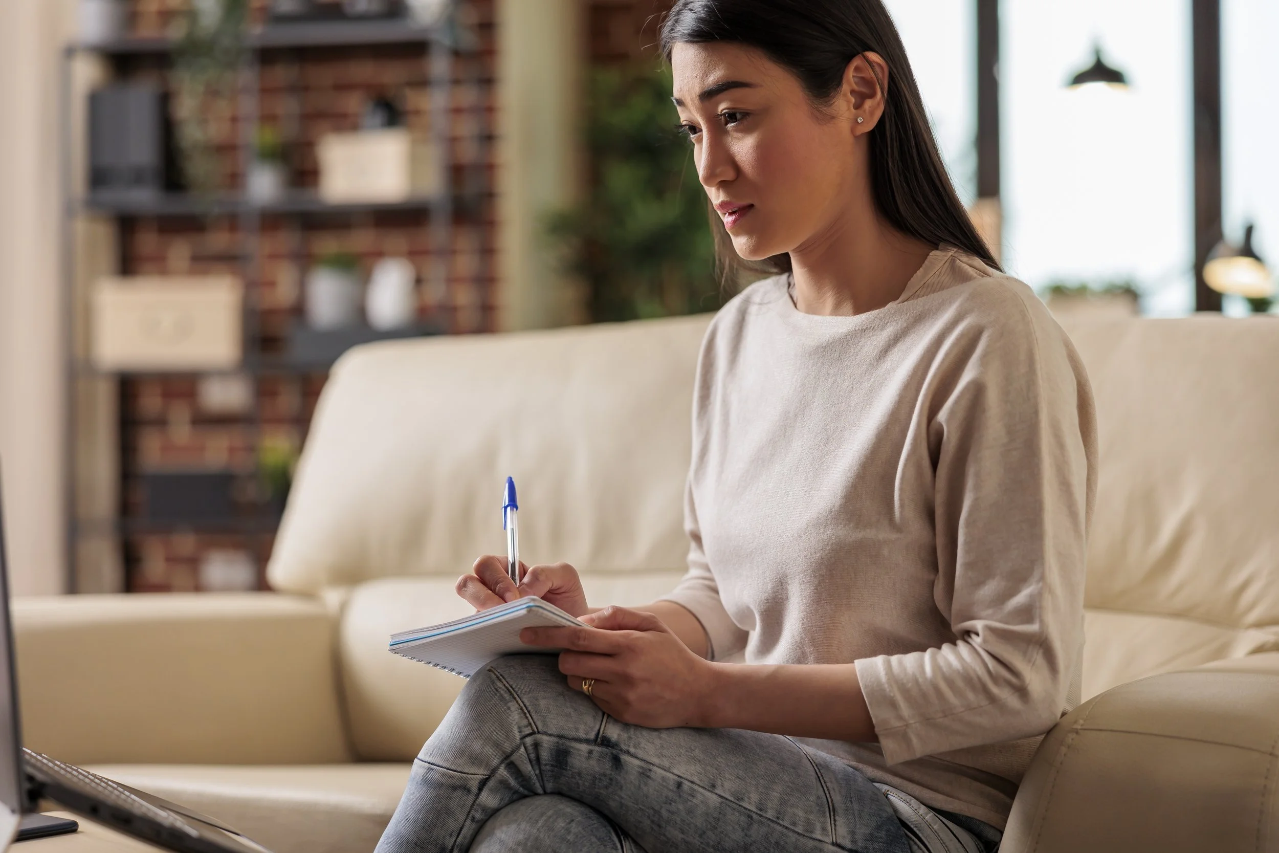 Person feeling overwhelmed by therapy choices while searching for help.