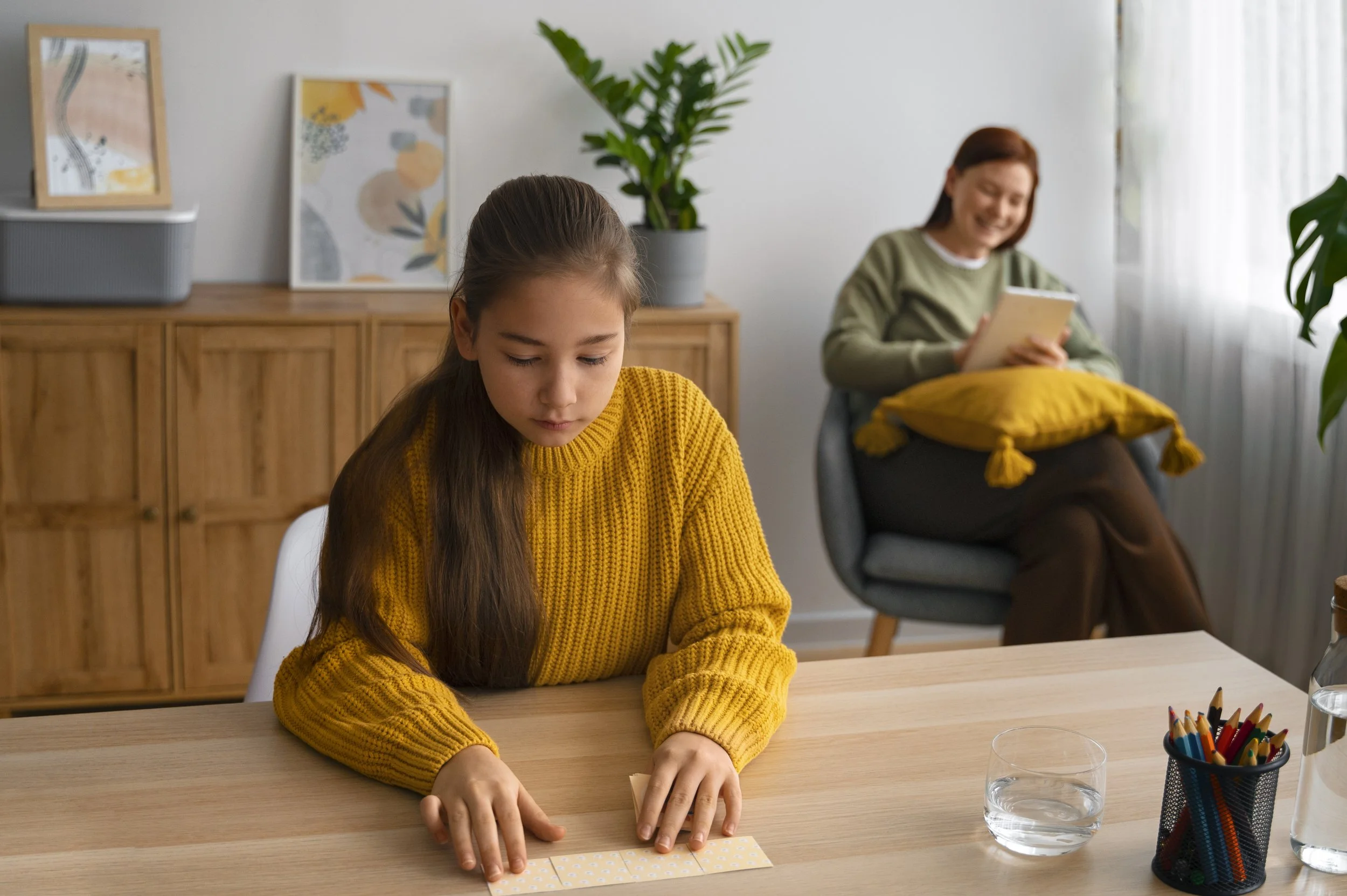 Young girl  with ADHD organizing daily tasks and routines using therapy strategies.