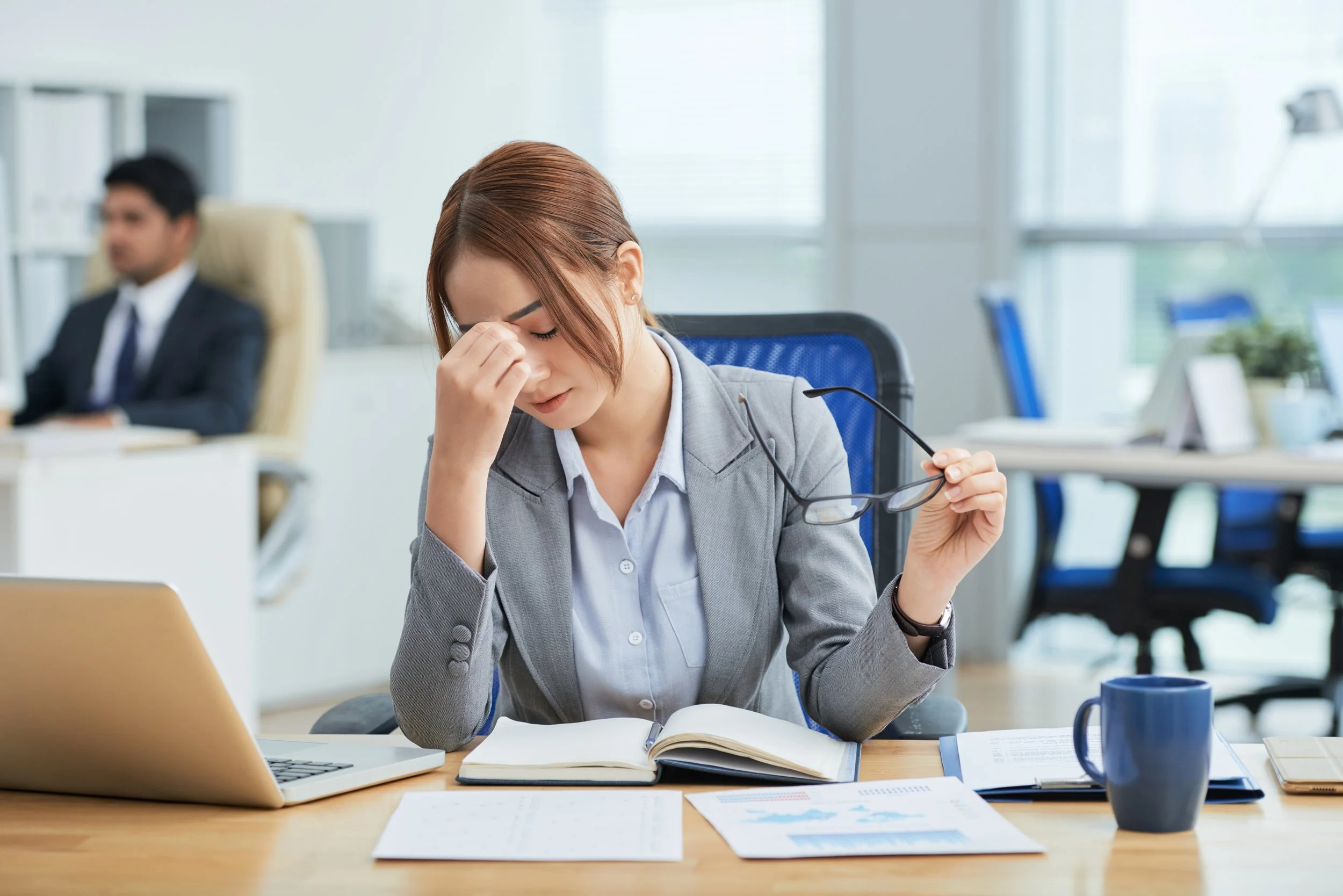 Person feeling overwhelmed by ongoing stress and emotional exhaustion.