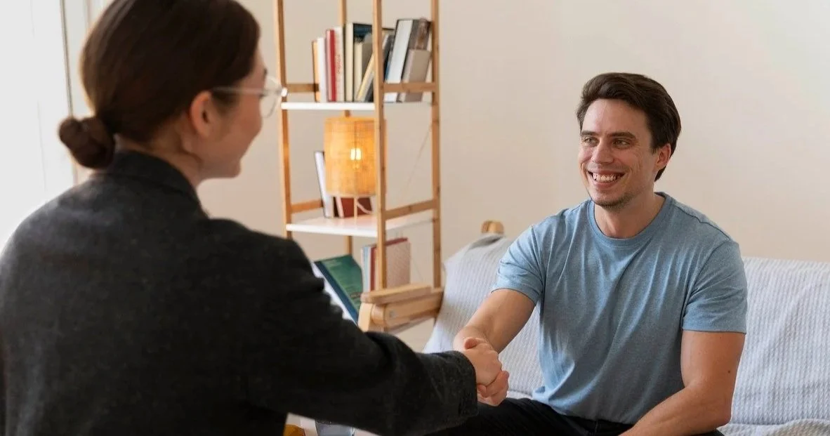 Client and therapist engaged in mental health counseling conversation