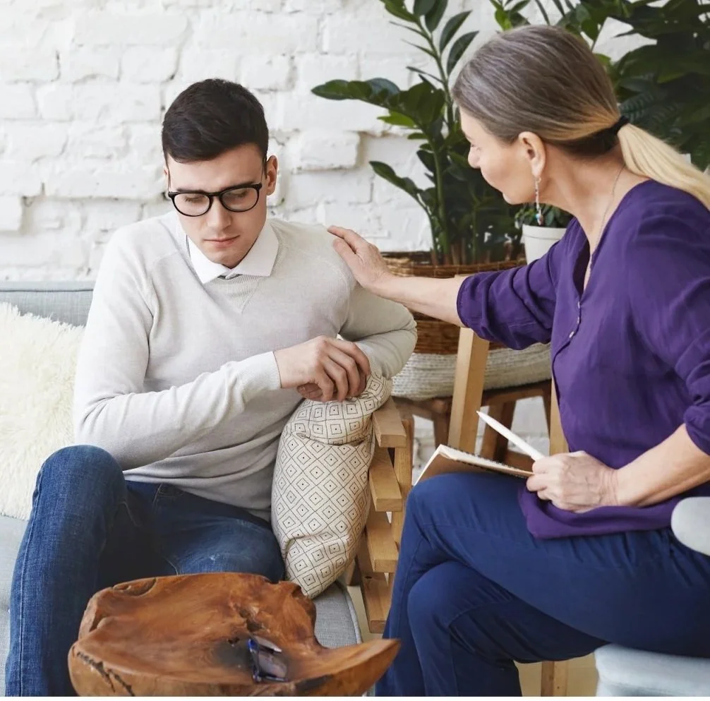 “Therapy session highlighting the importance of seeking help for mental health.”