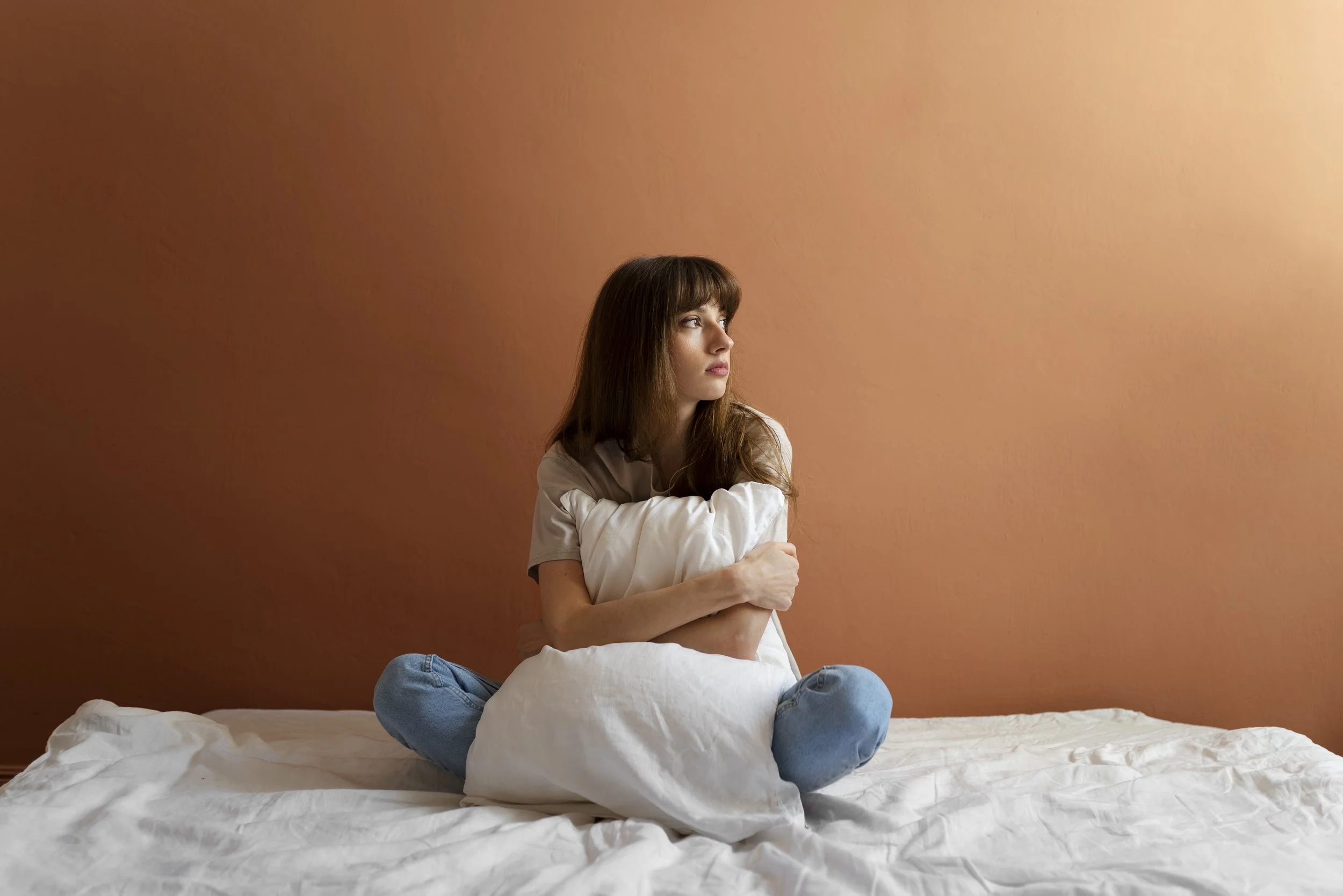Person reflecting on mental patterns and intrusive thinking.